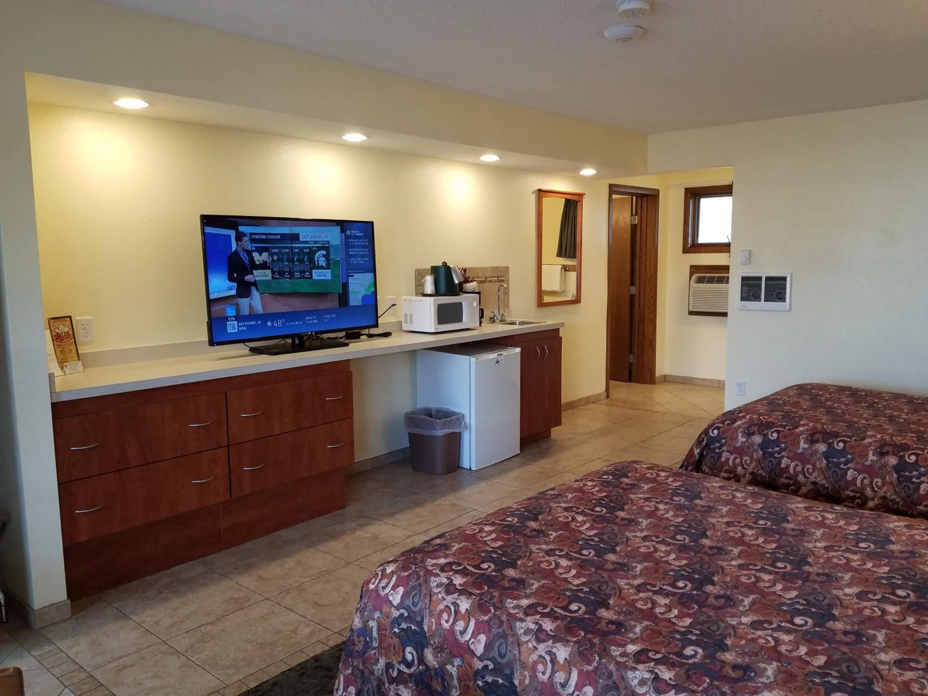 Bed in Black Hawk Motel & Suites