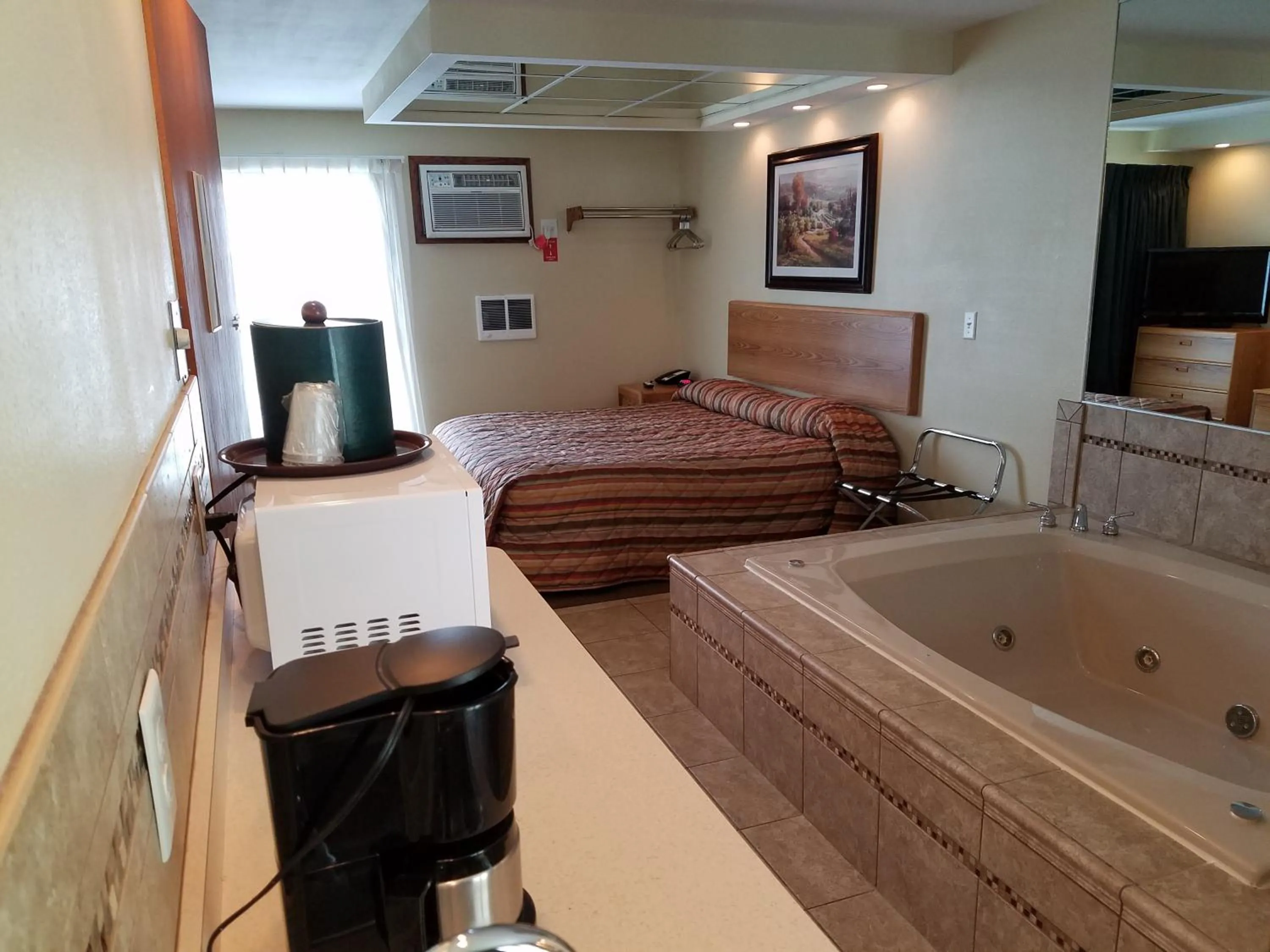 Bed in Black Hawk Motel & Suites