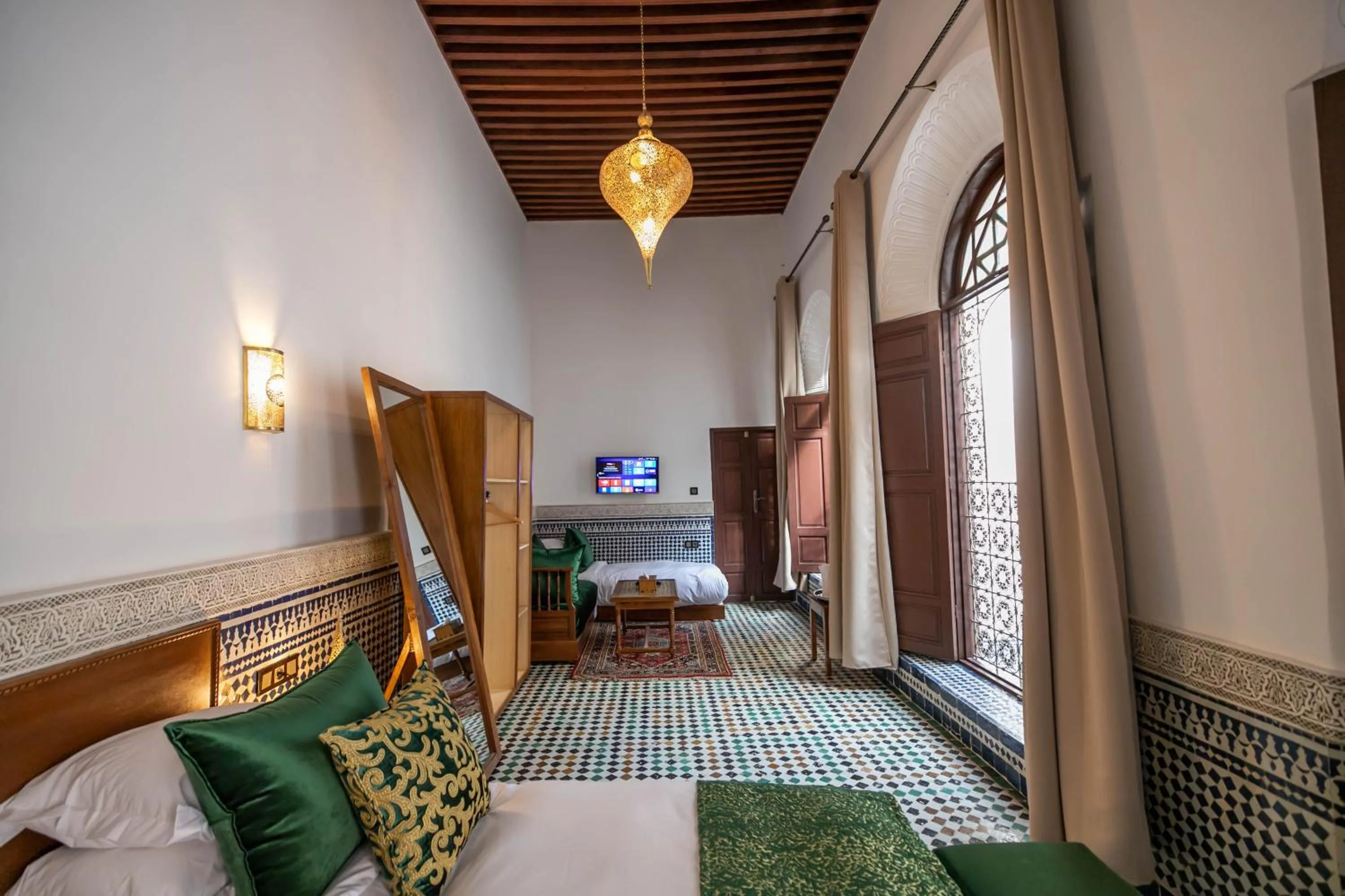 Bed in Riad Fes Ziyat & Spa