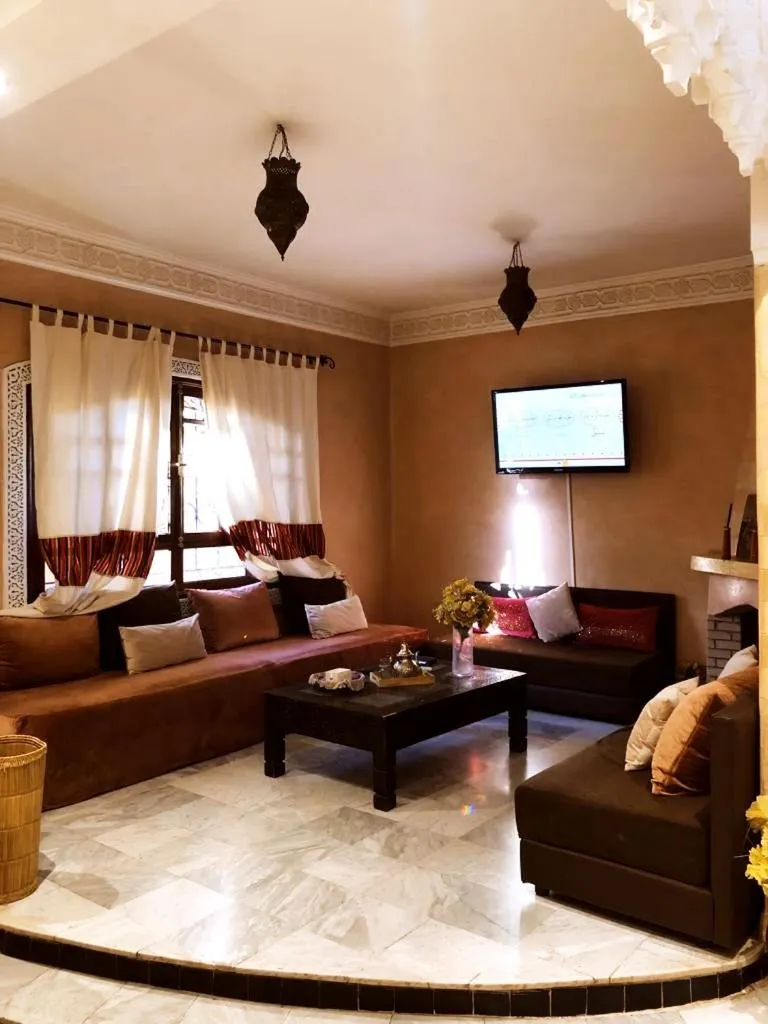 TV and multimedia in maison d'hôtes Le petit jardin Marrakech