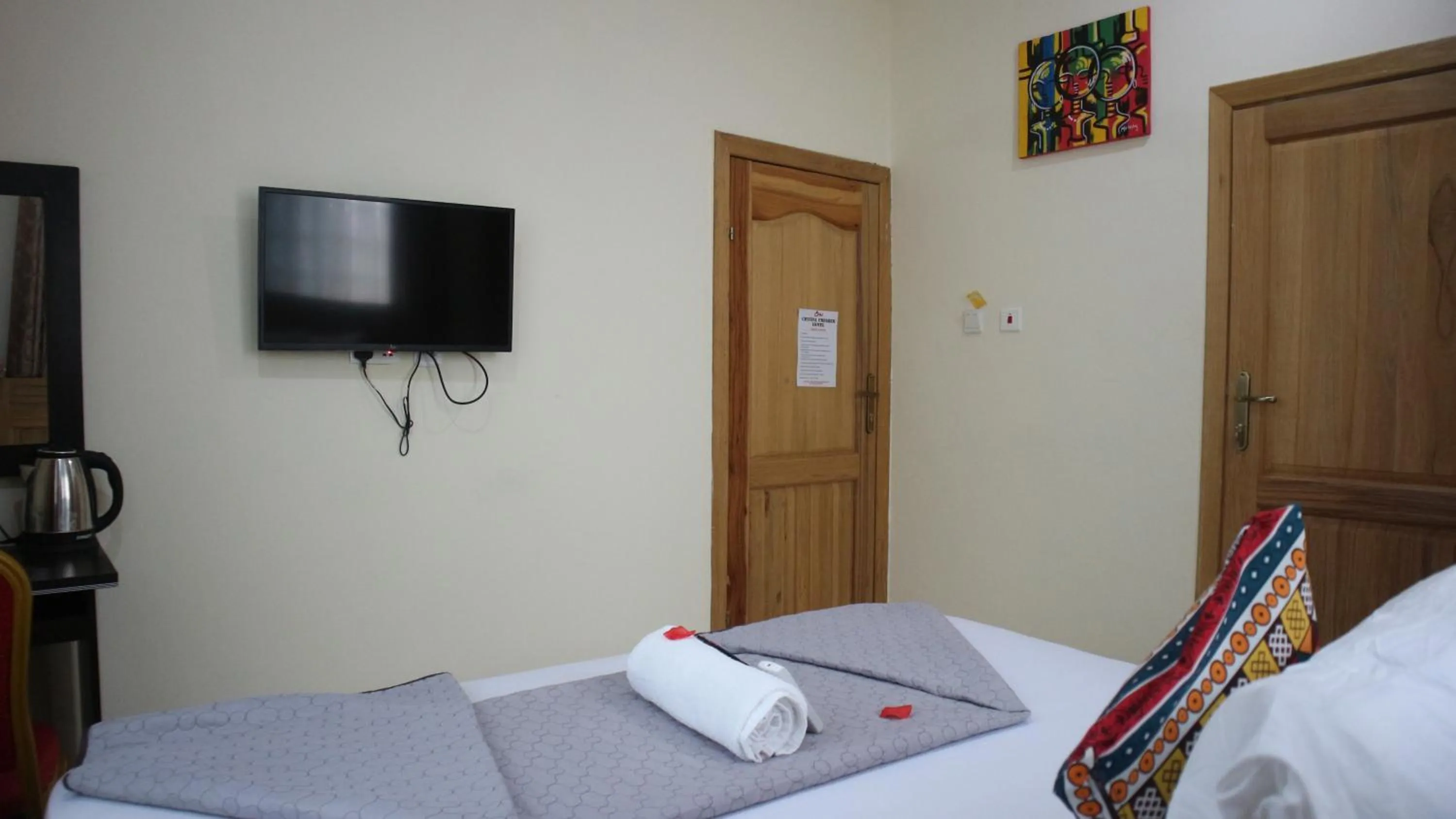 Bed in Crystal Premier Hotel