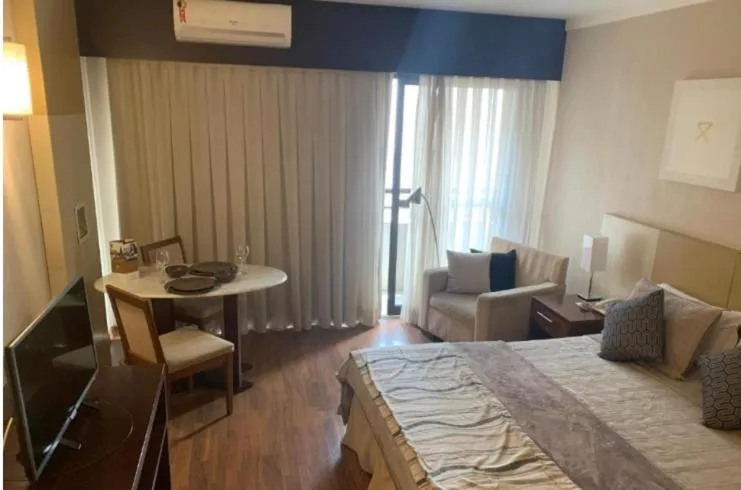 Bed in Grand Plaza Paulista Hotel