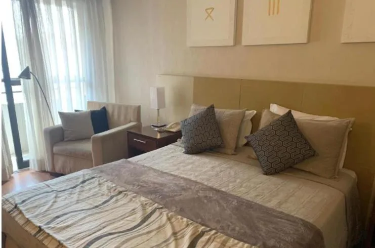 Bed in Grand Plaza Paulista Hotel