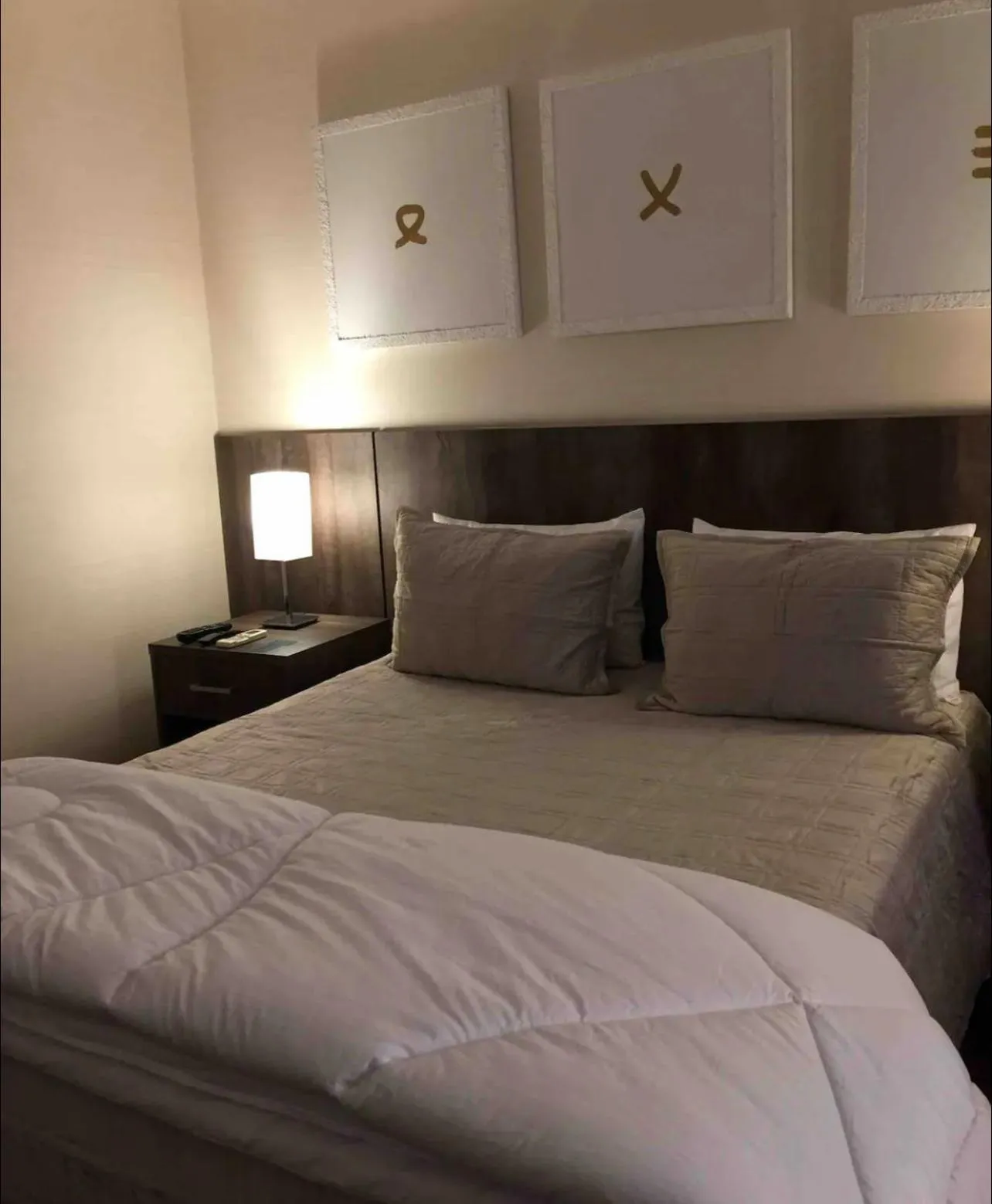 Bed in Grand Plaza Paulista Hotel