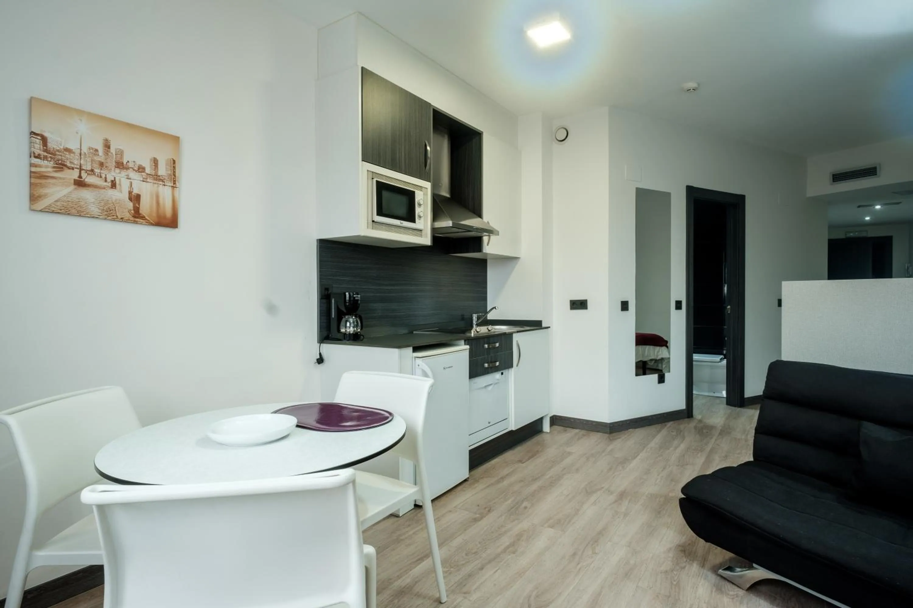 Kitchen or kitchenette in Apartamentos Capua