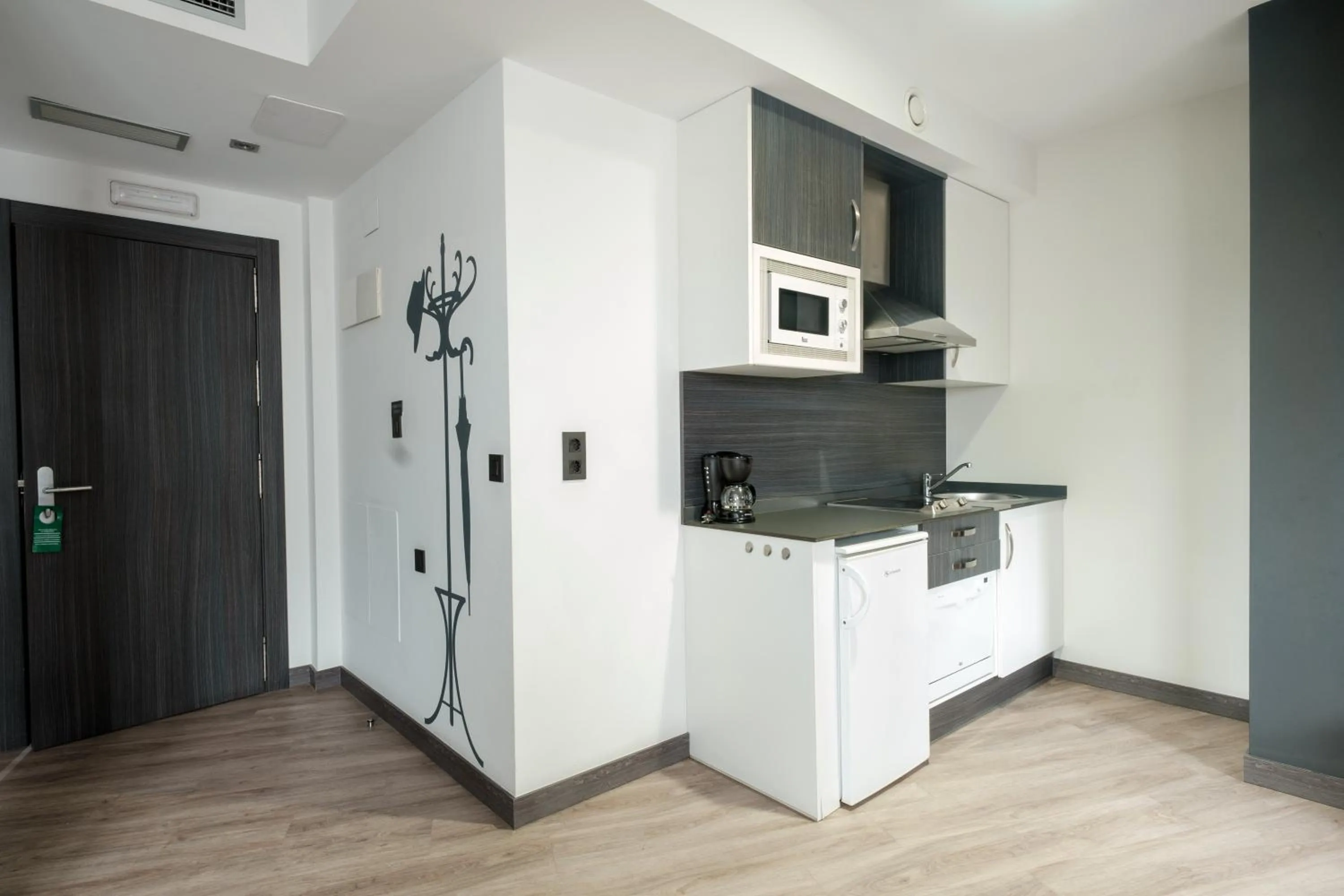 Kitchen or kitchenette in Apartamentos Capua