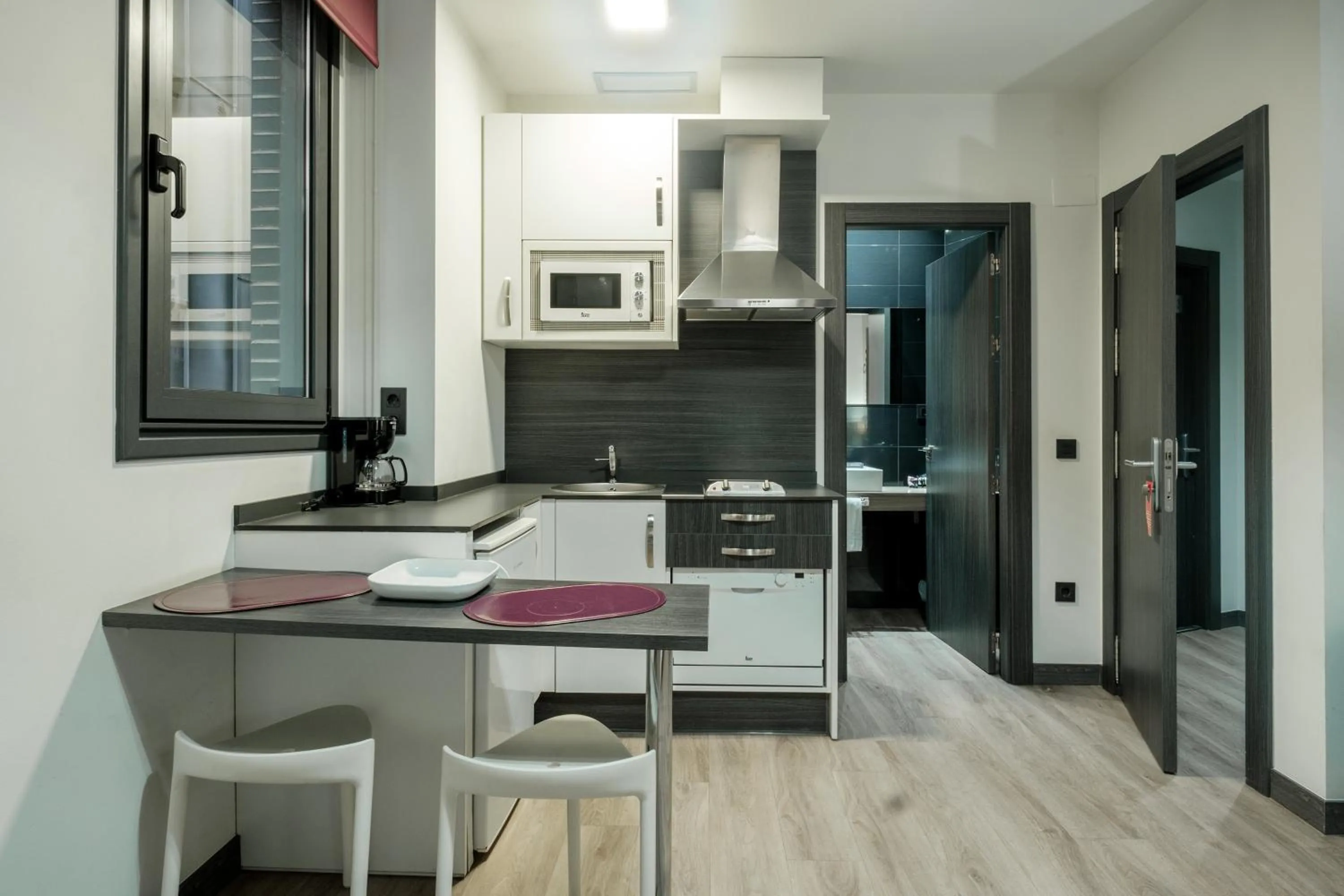 Kitchen or kitchenette in Apartamentos Capua
