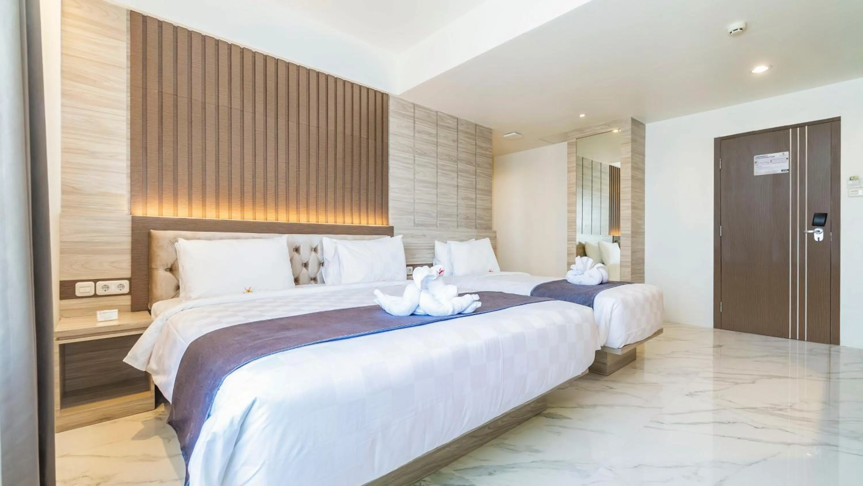 Bed in City of Aventus Hotel - Denpasar