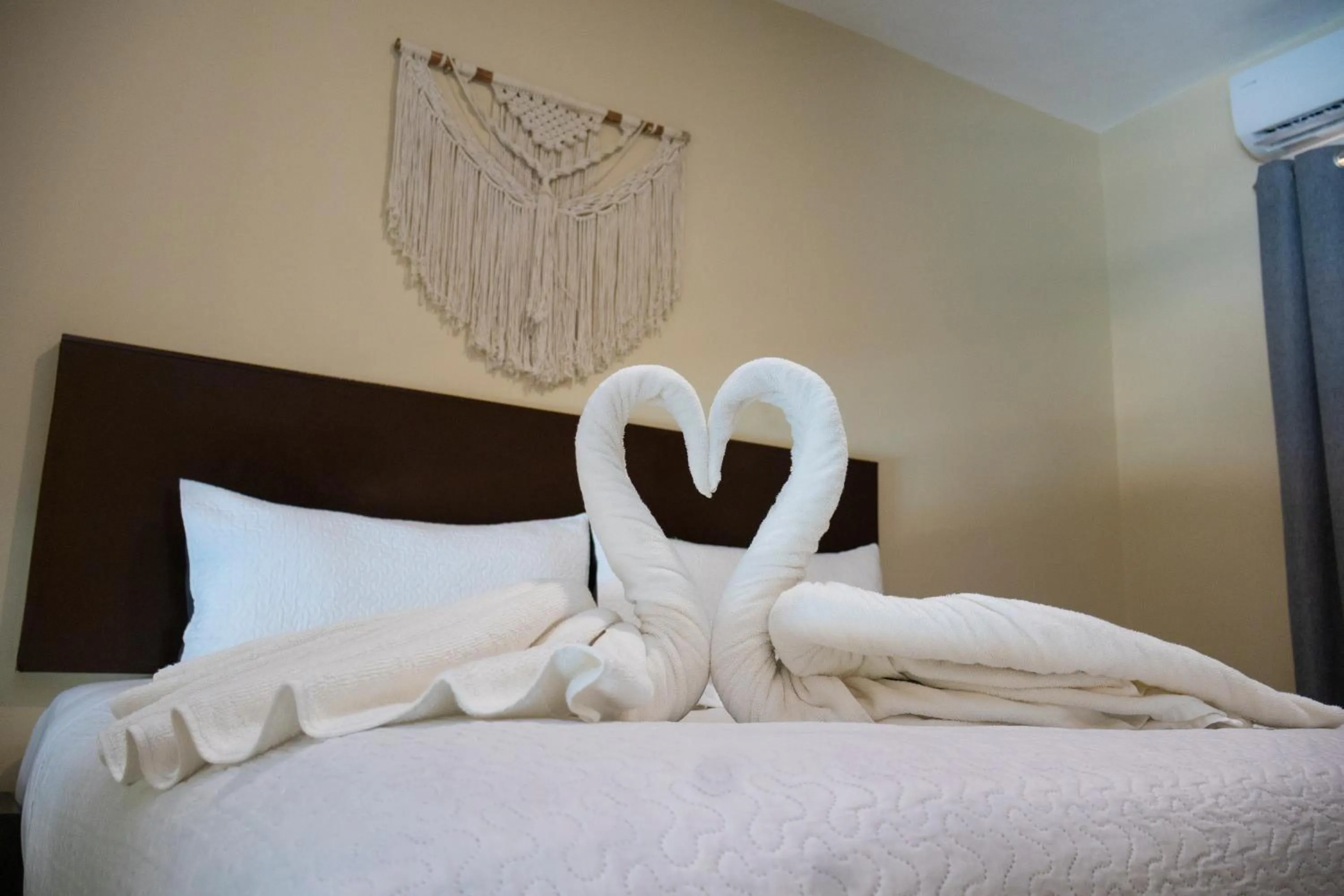 Bed in Ammare Hotel Boutique