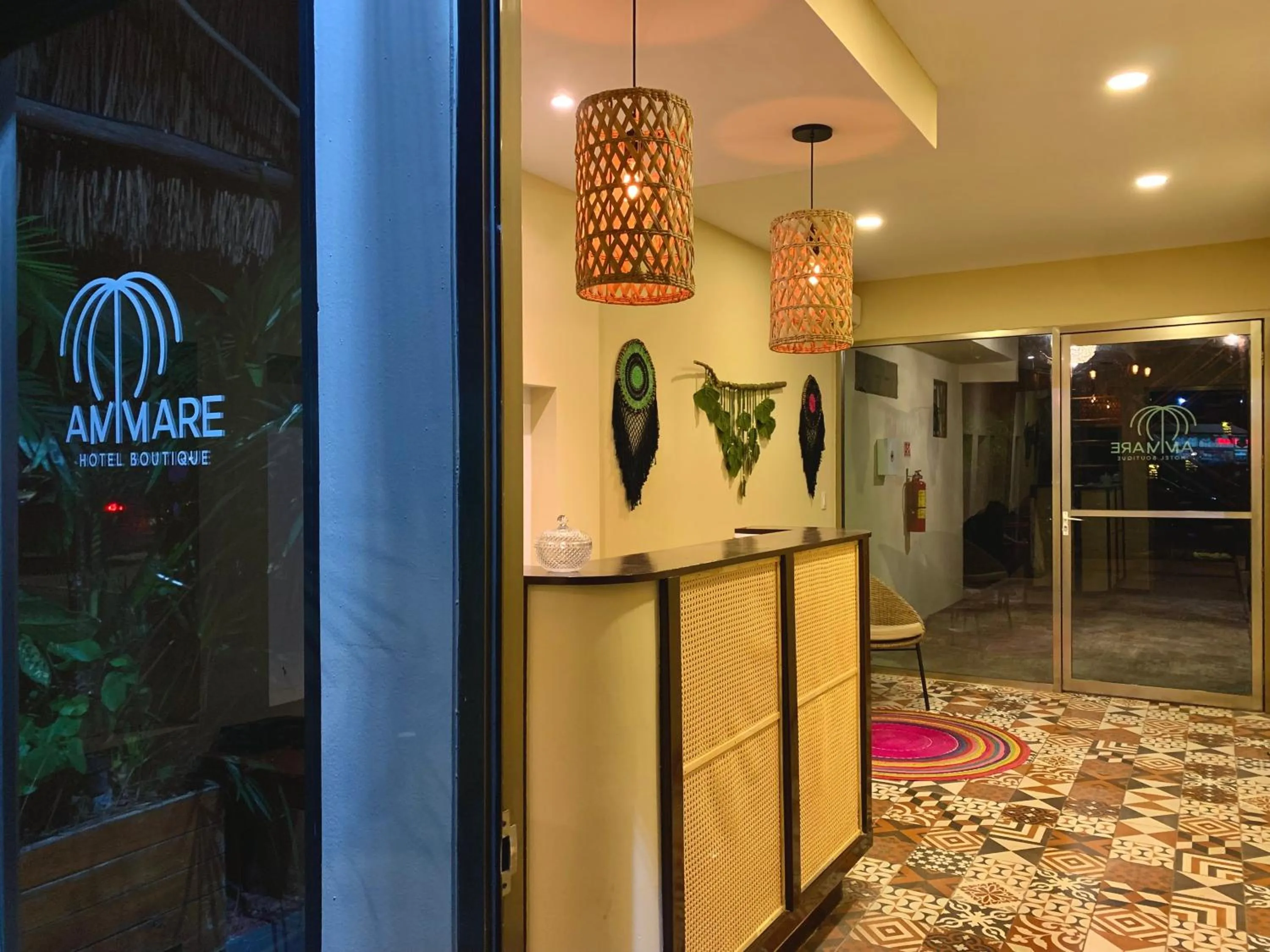 Property logo or sign in Ammare Hotel Boutique