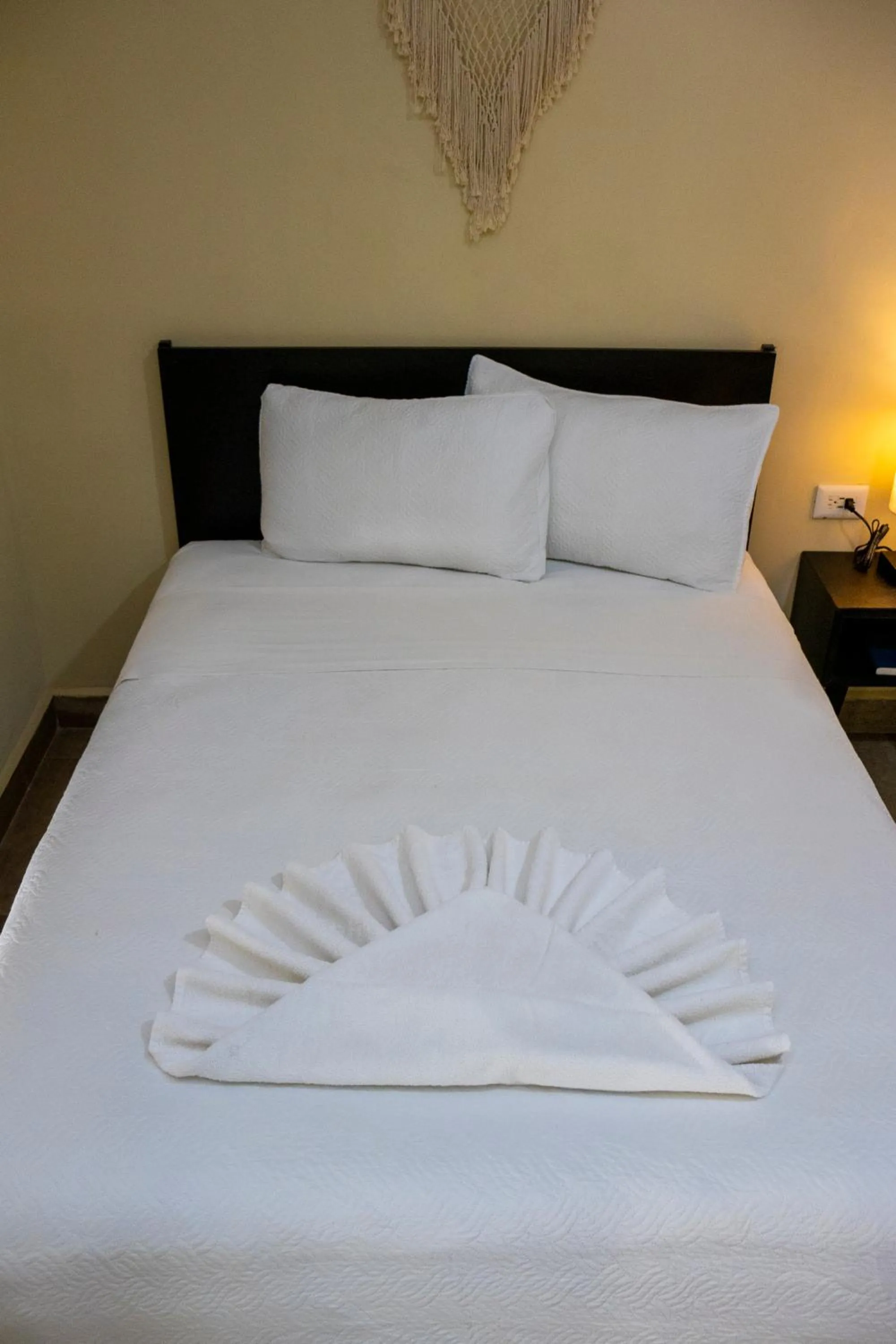 Bed in Ammare Hotel Boutique