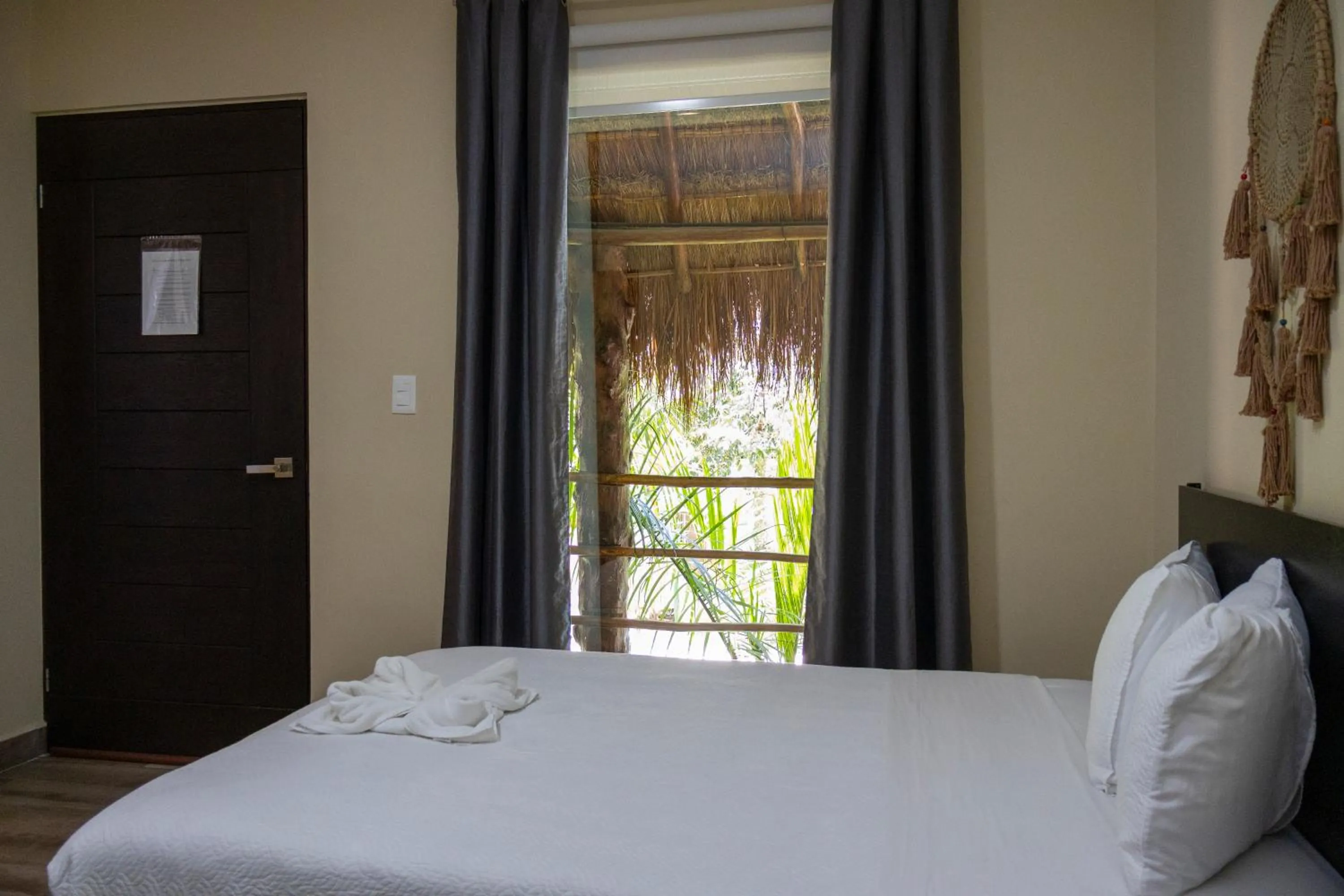 Bed in Ammare Hotel Boutique