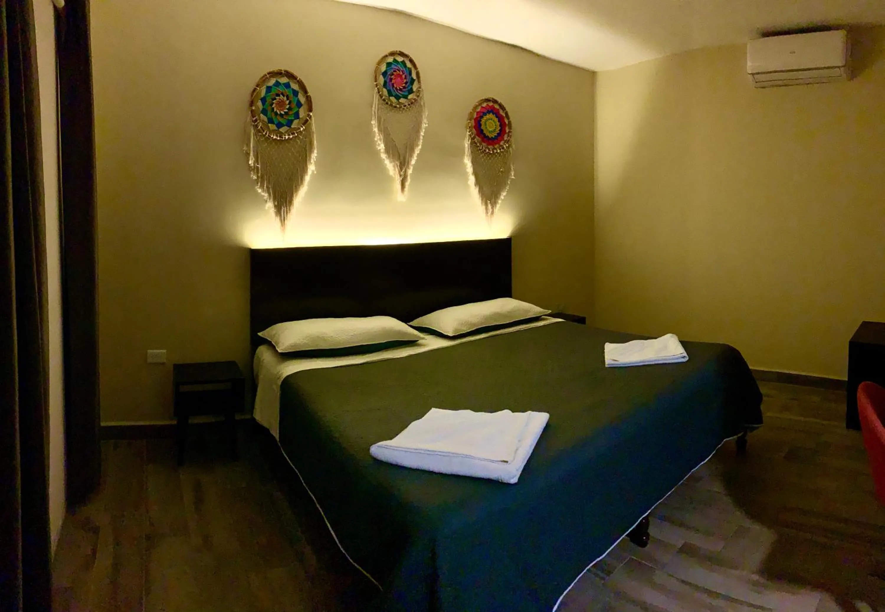 Bed in Ammare Hotel Boutique