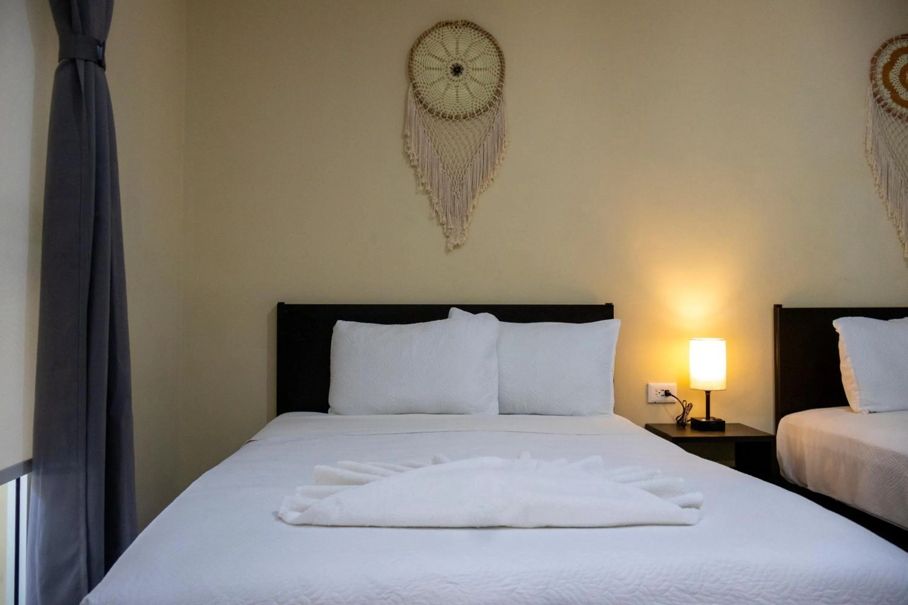 Bed in Ammare Hotel Boutique