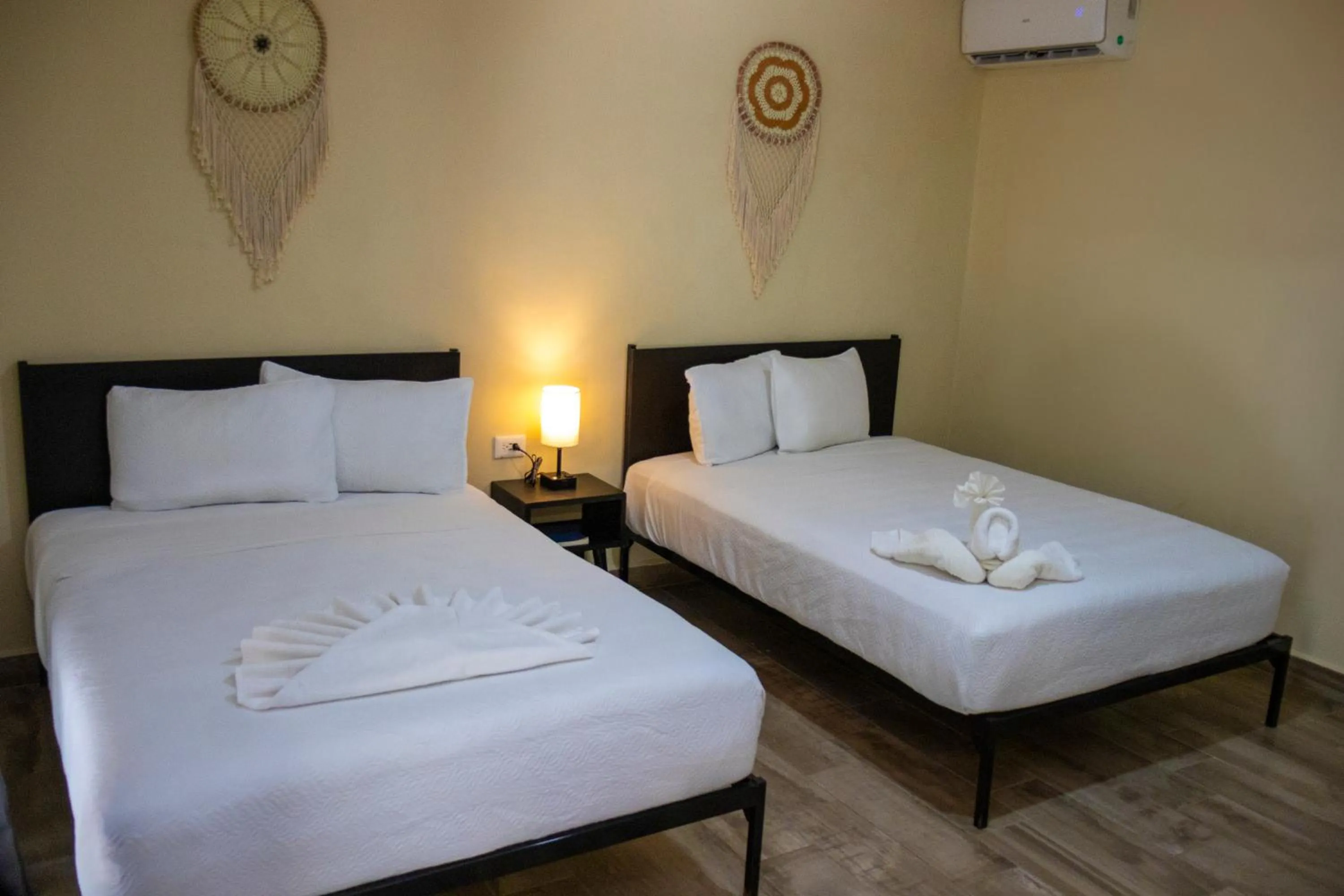 Bed in Ammare Hotel Boutique