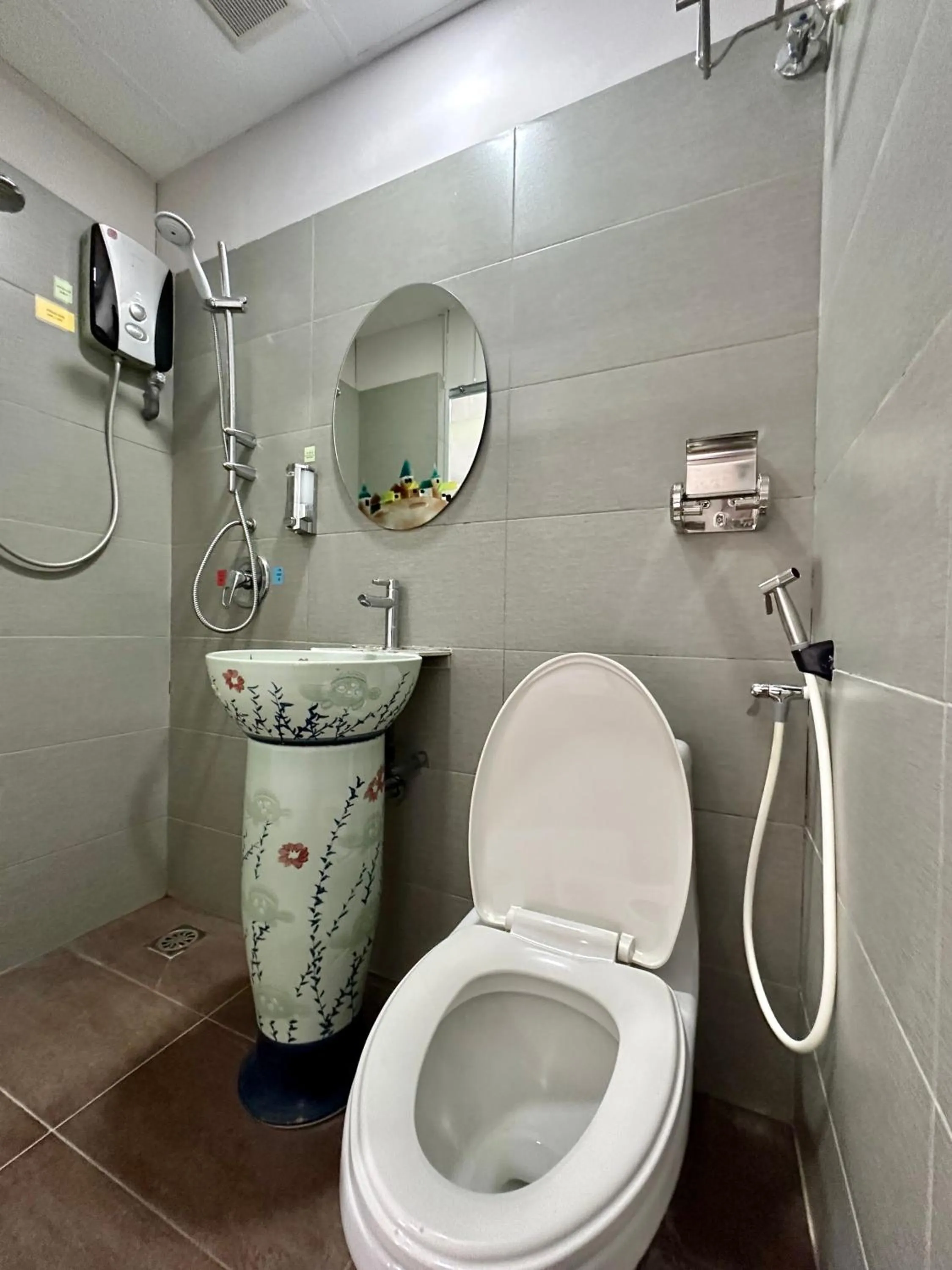 Shower in Dingdong Homes Hotel