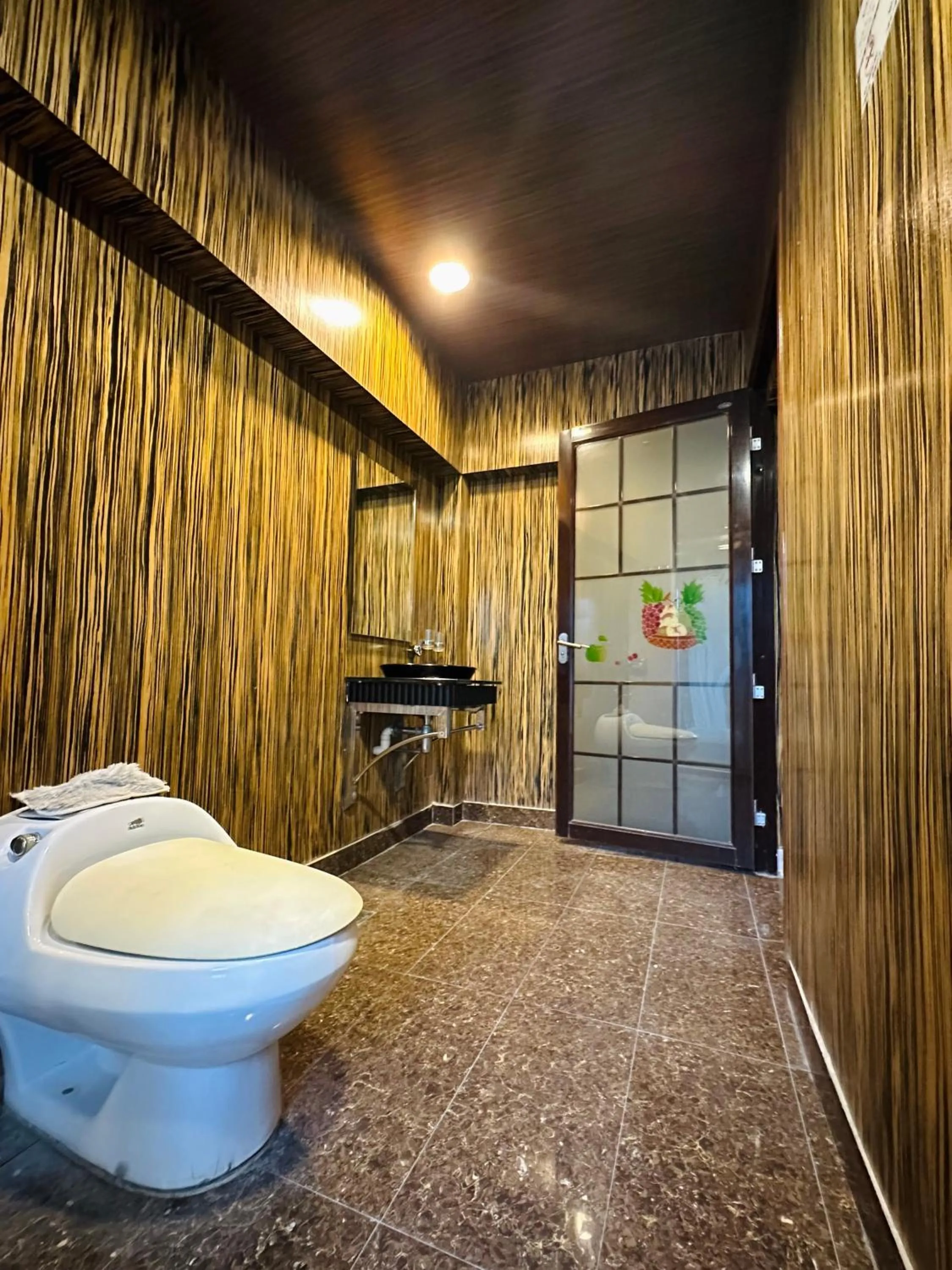Toilet in Dingdong Homes Hotel