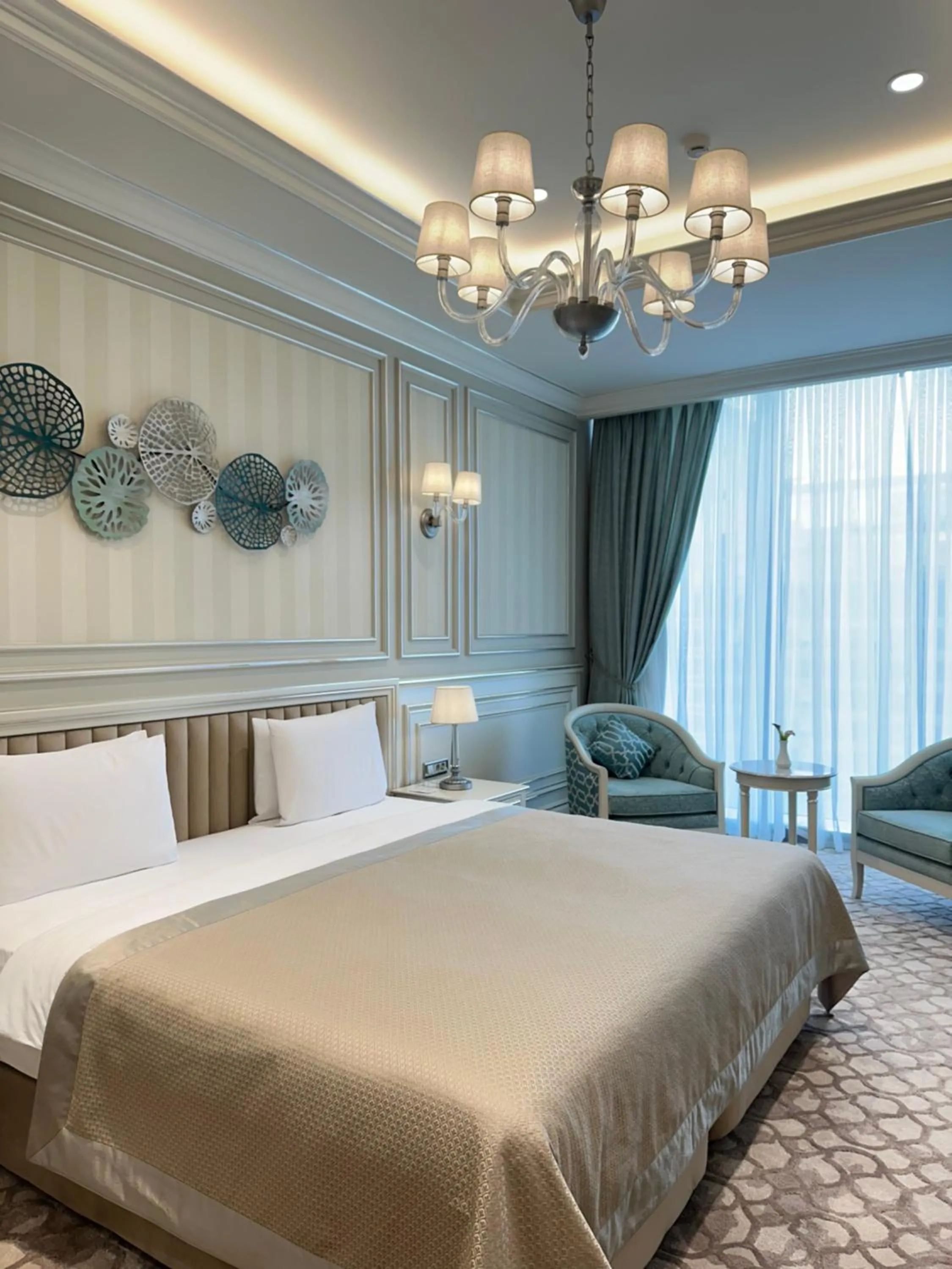 Bed in T-CITY PRESIDENTIAL HOTEL