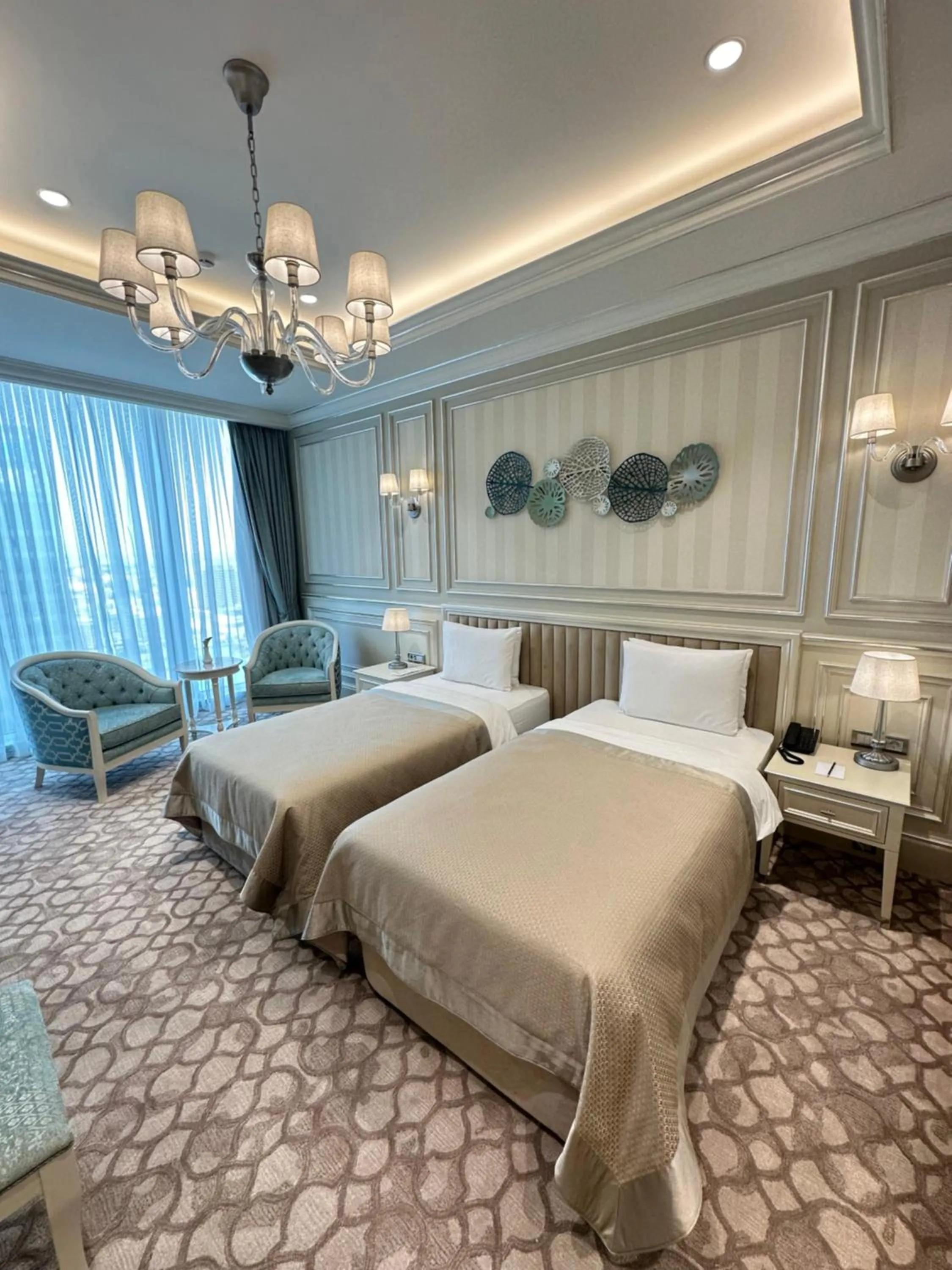 Bed in T-CITY PRESIDENTIAL HOTEL