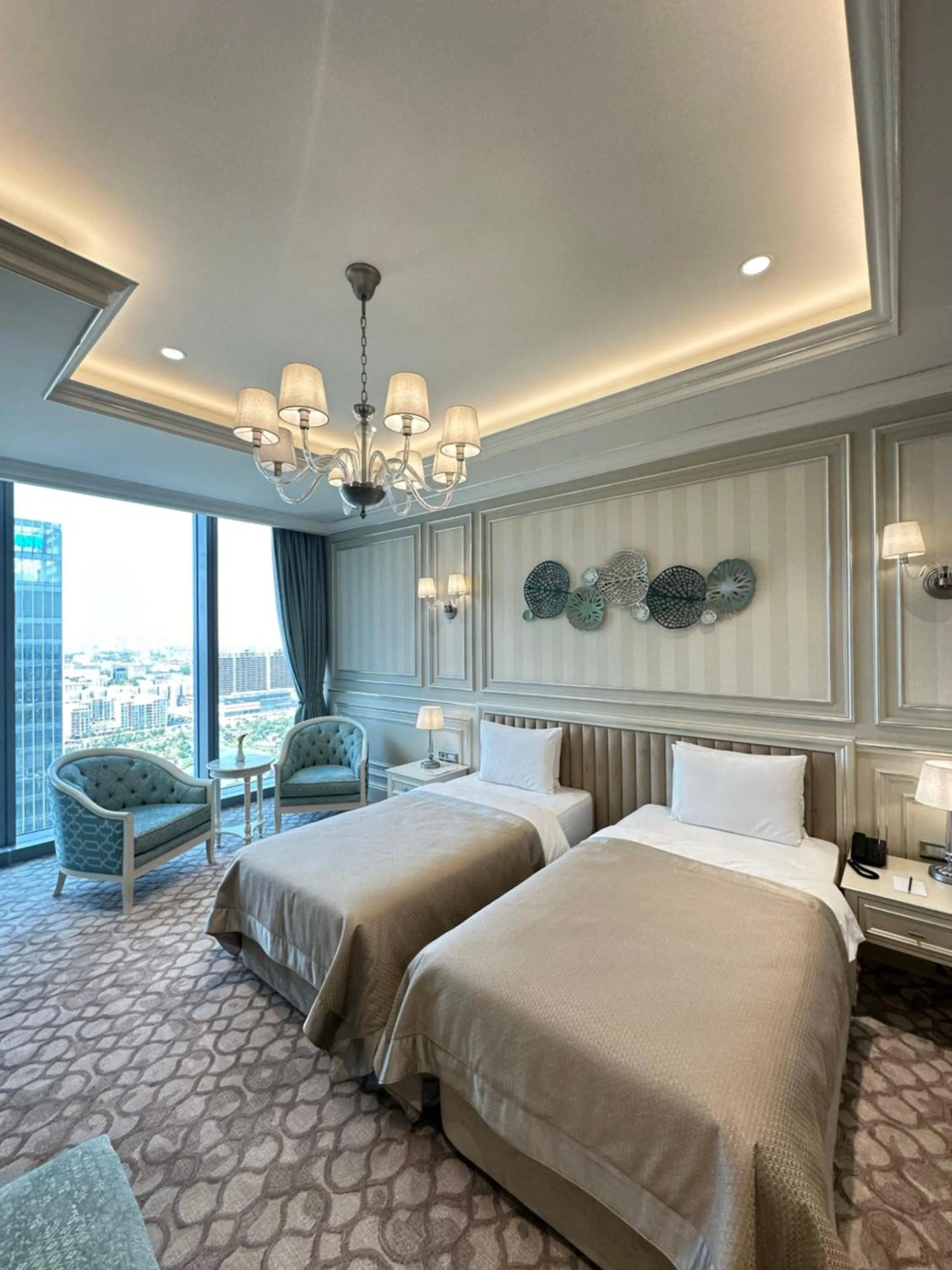 Bed in T-CITY PRESIDENTIAL HOTEL