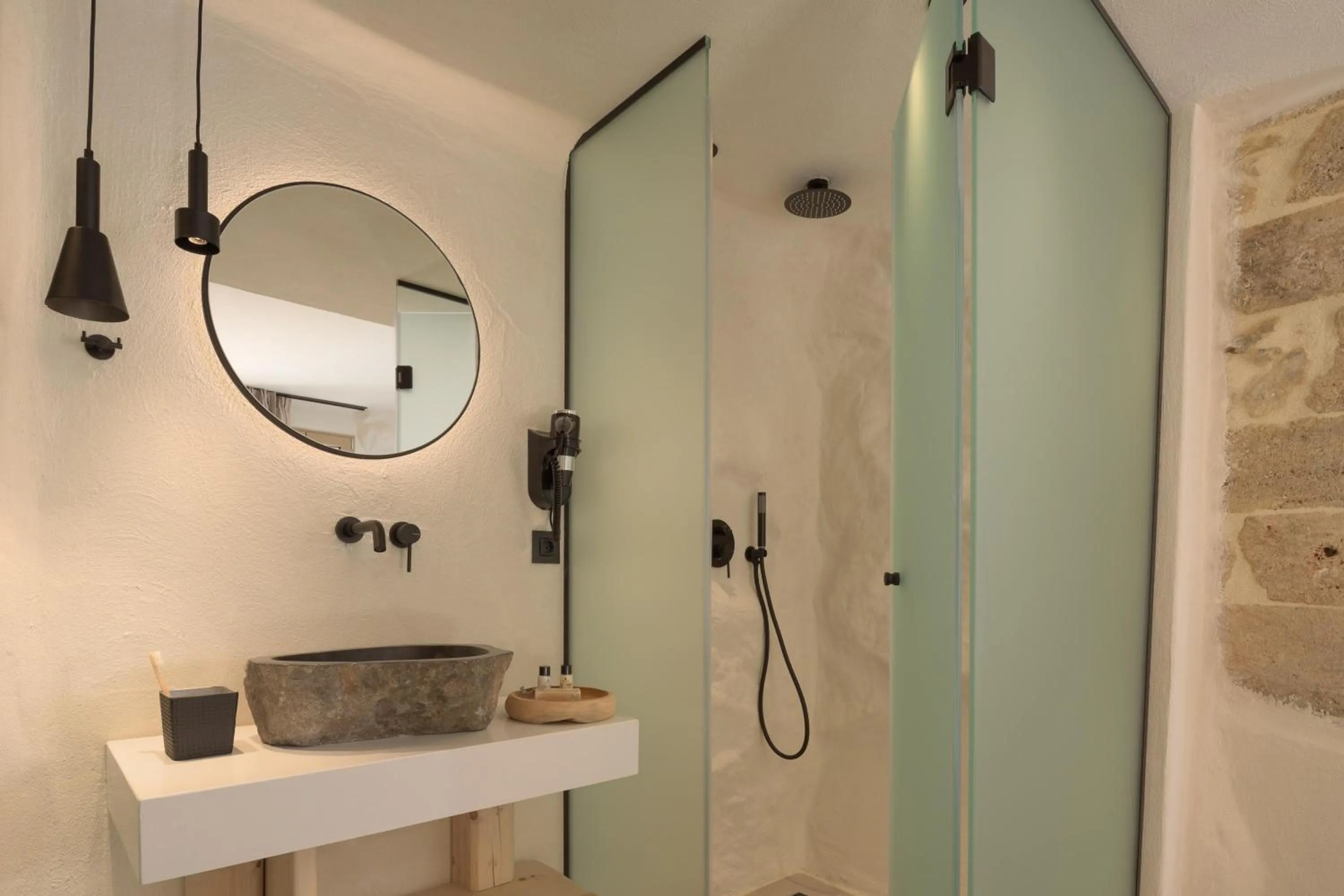 Bathroom in Manili Boutique Suites & Villas