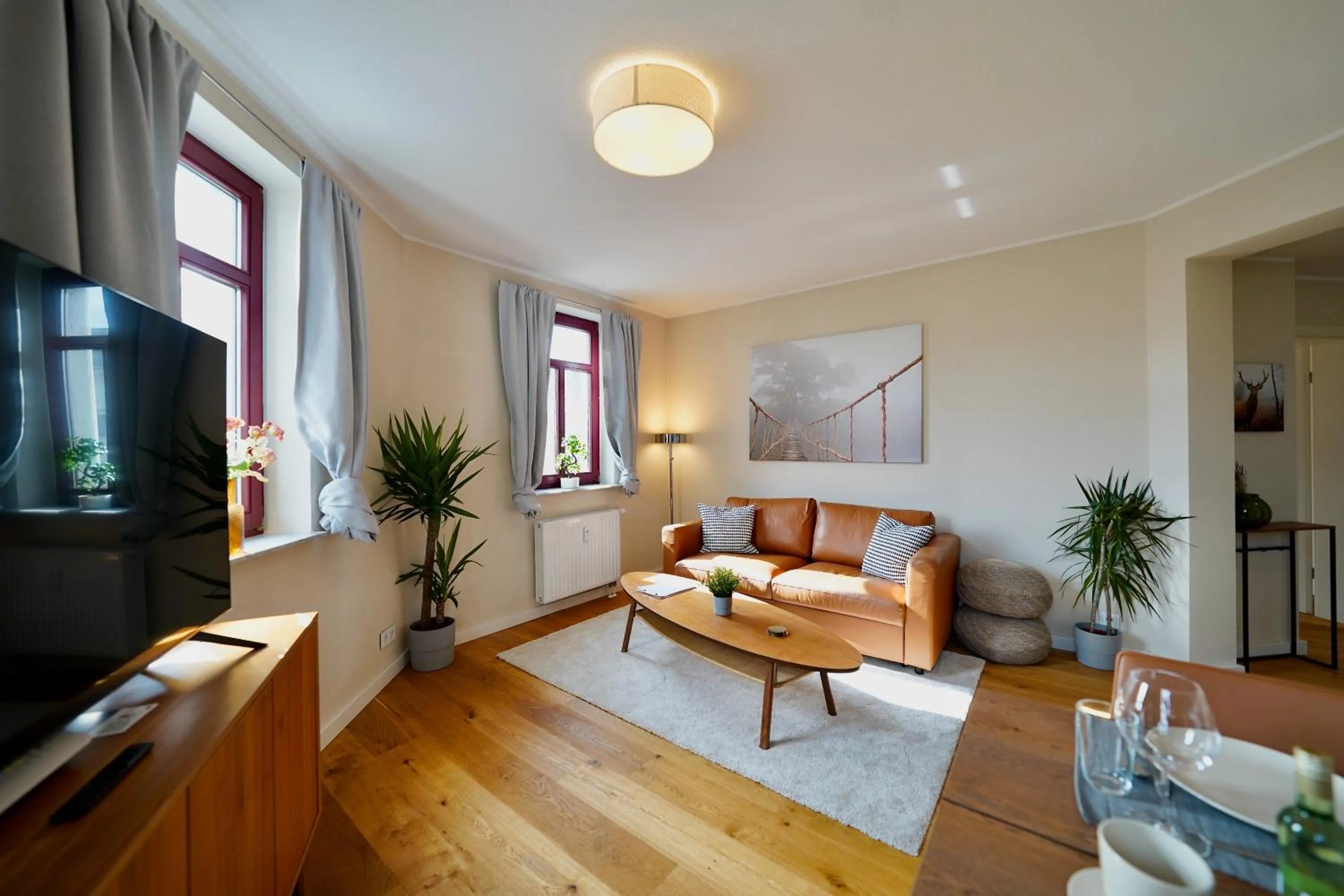 TV and multimedia in EDLER WOHNRAUM Noble Stadtoase mit Boxspringbett, Kaffeevollautomat & Parkplatz