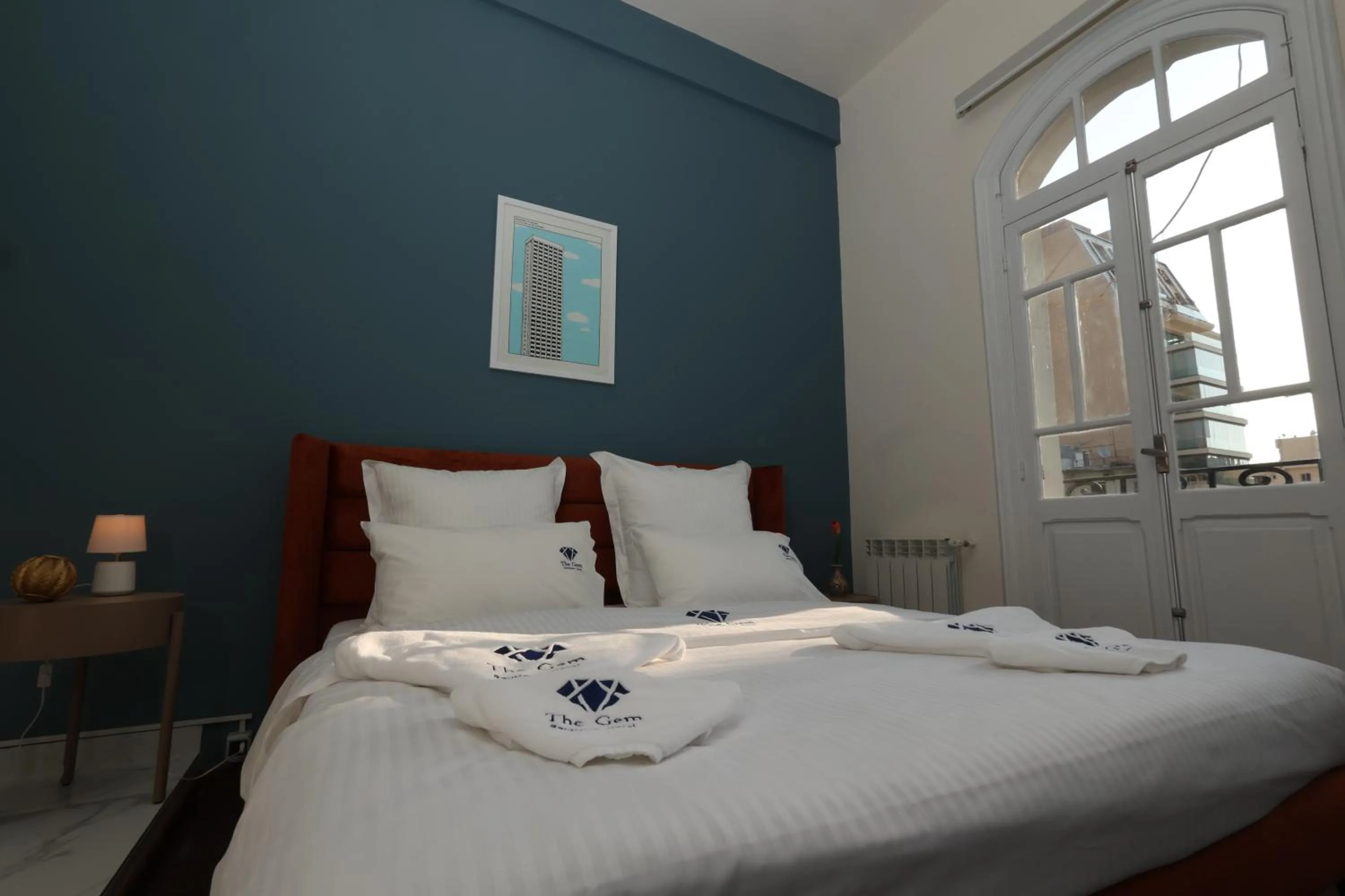 Bed in THE GEM BOUTIQUE HOTEL