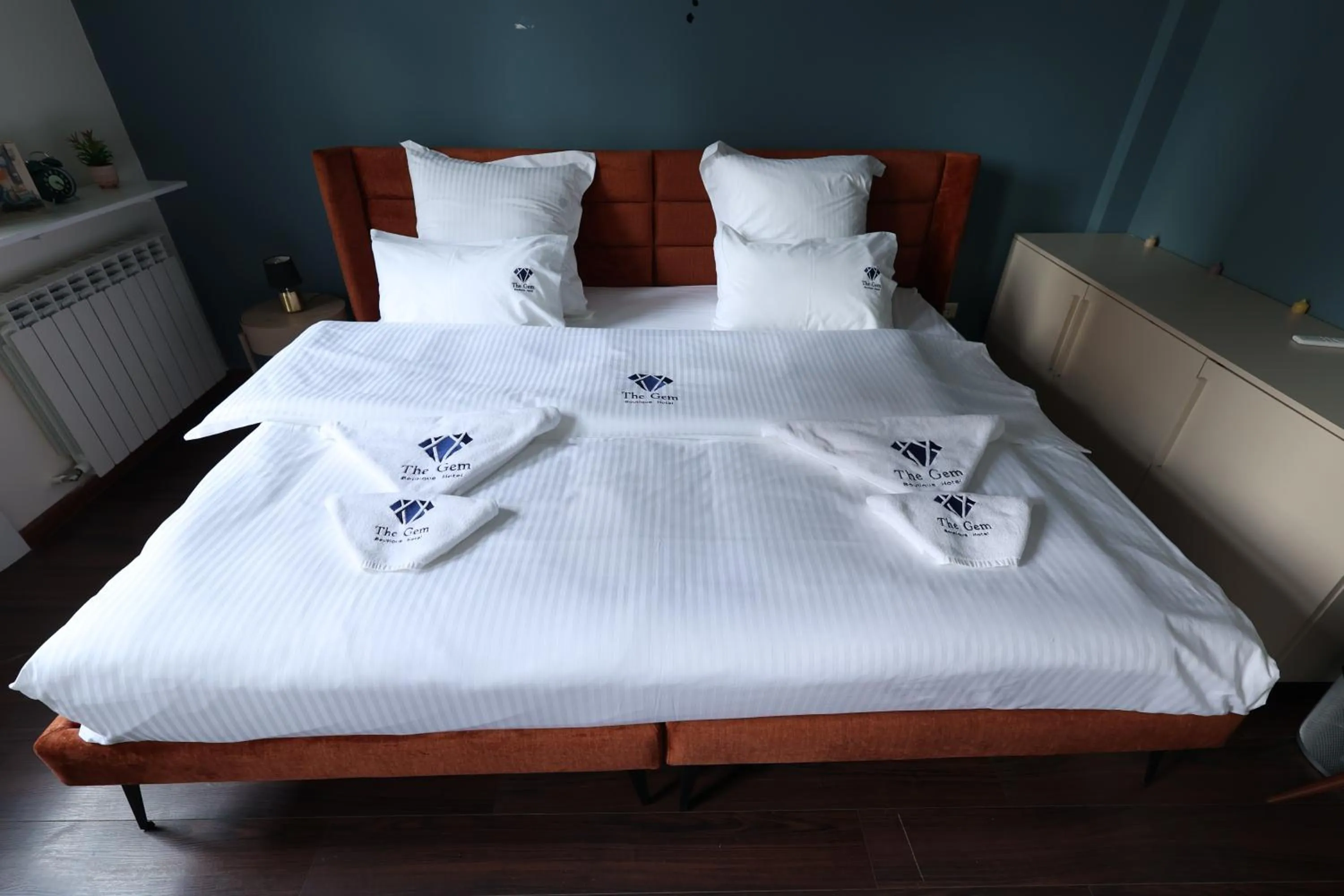 Bed in THE GEM BOUTIQUE HOTEL