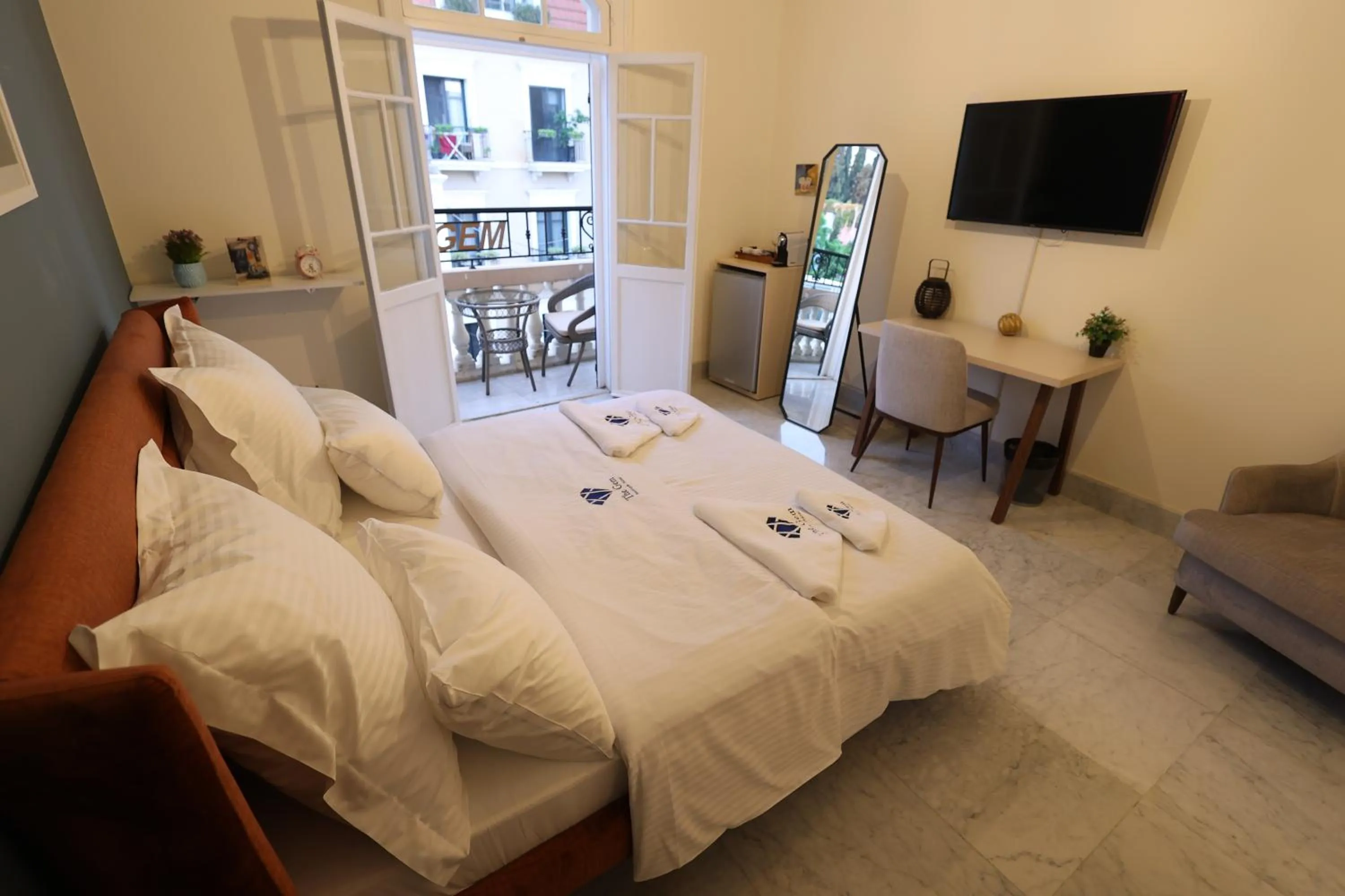 Bed in THE GEM BOUTIQUE HOTEL