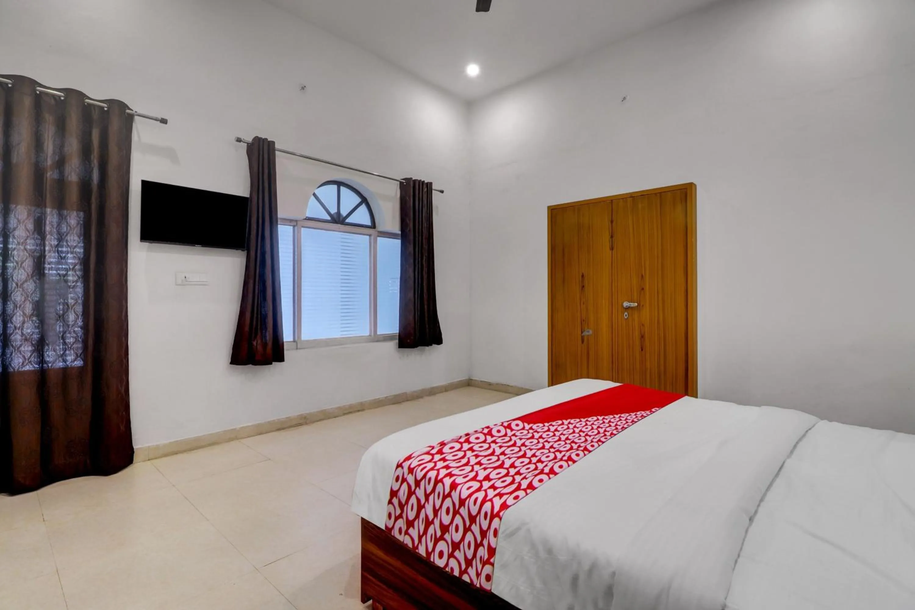 Bedroom in Itsy Hotels Om Pushp Residency