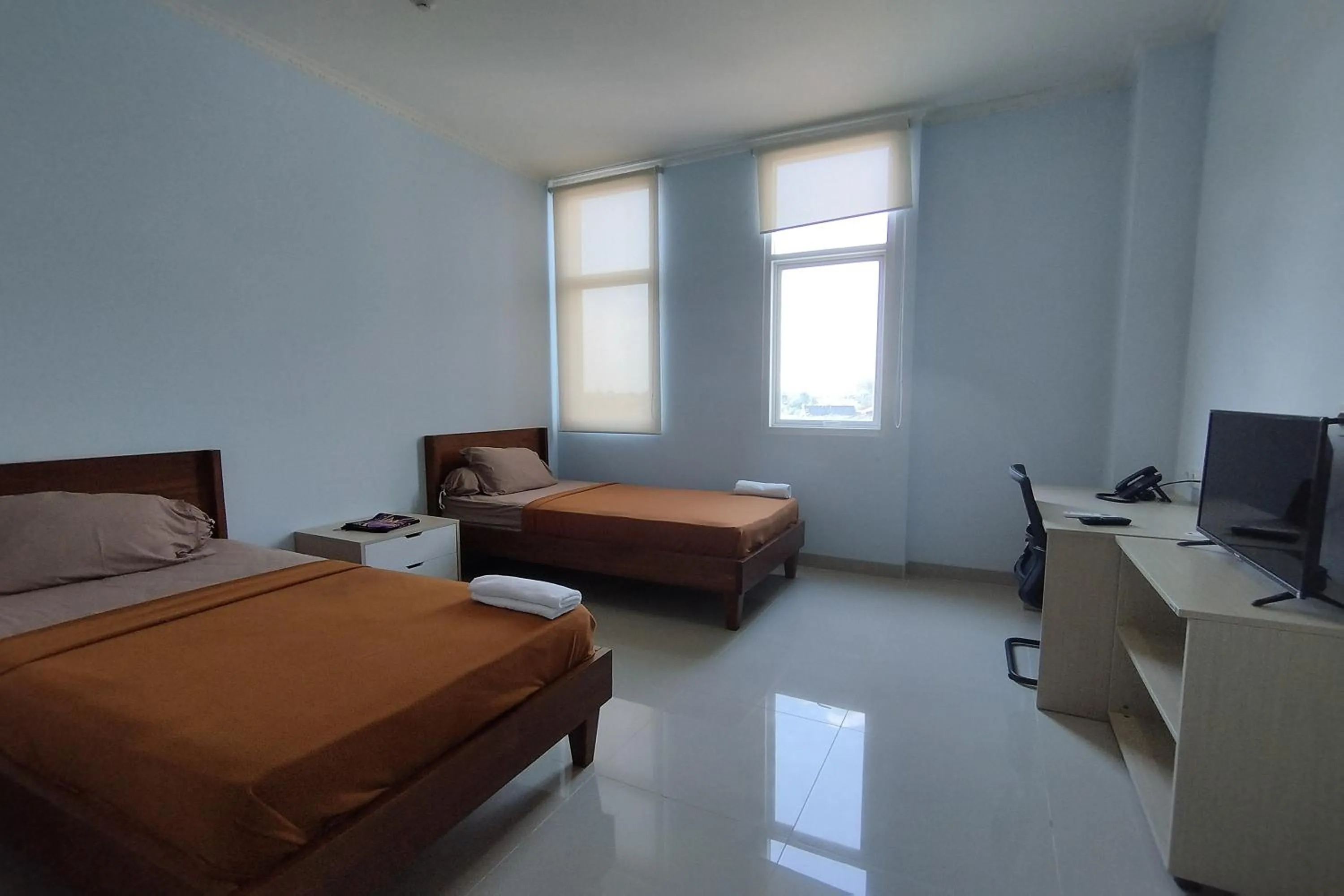 Bed in Hotel Sutha Inn Syariah