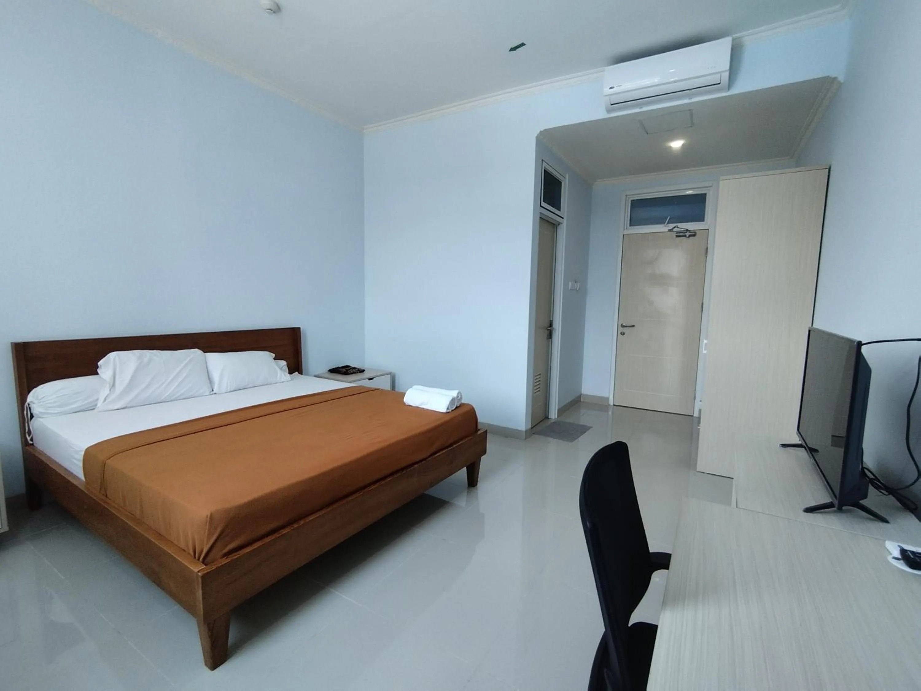 Bed in Hotel Sutha Inn Syariah