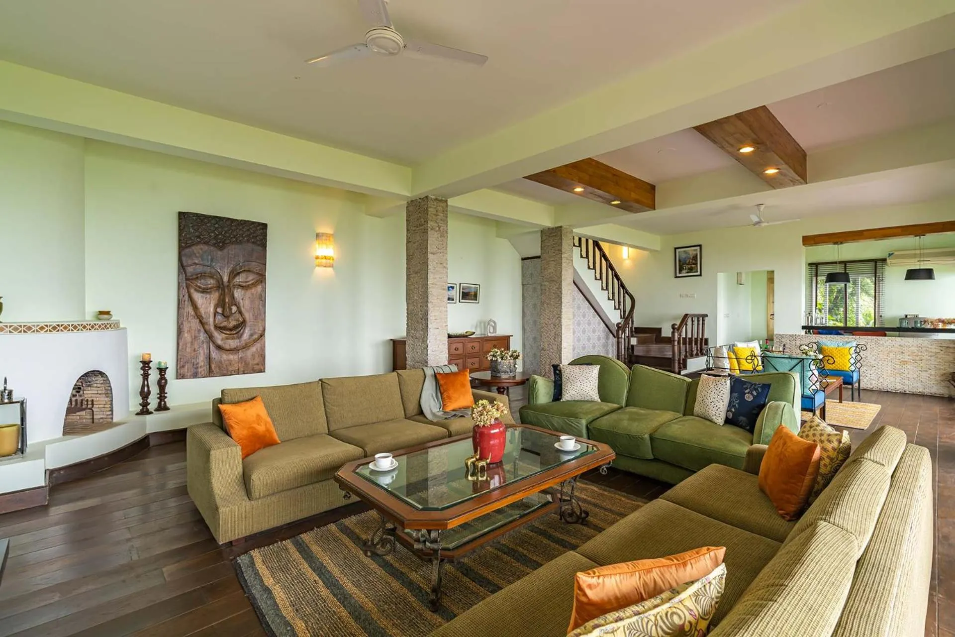 Living room in StayVista at Ludlow House Luxury Villa with Lawn & Fireplace at Mall Road