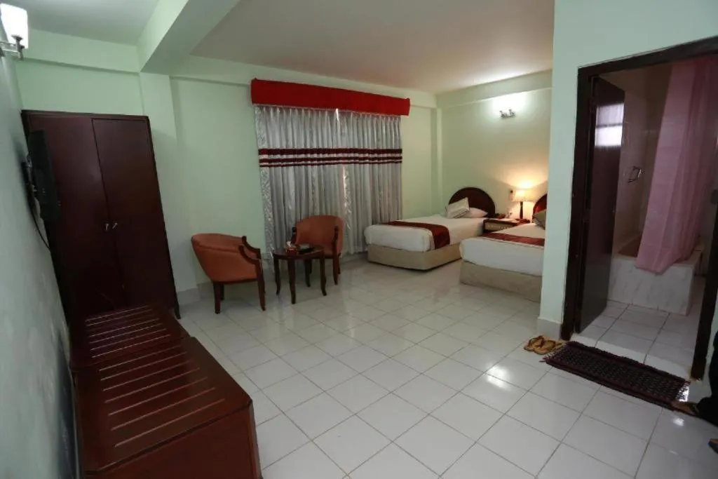 Bed in Meridian Hotel & Restaurant