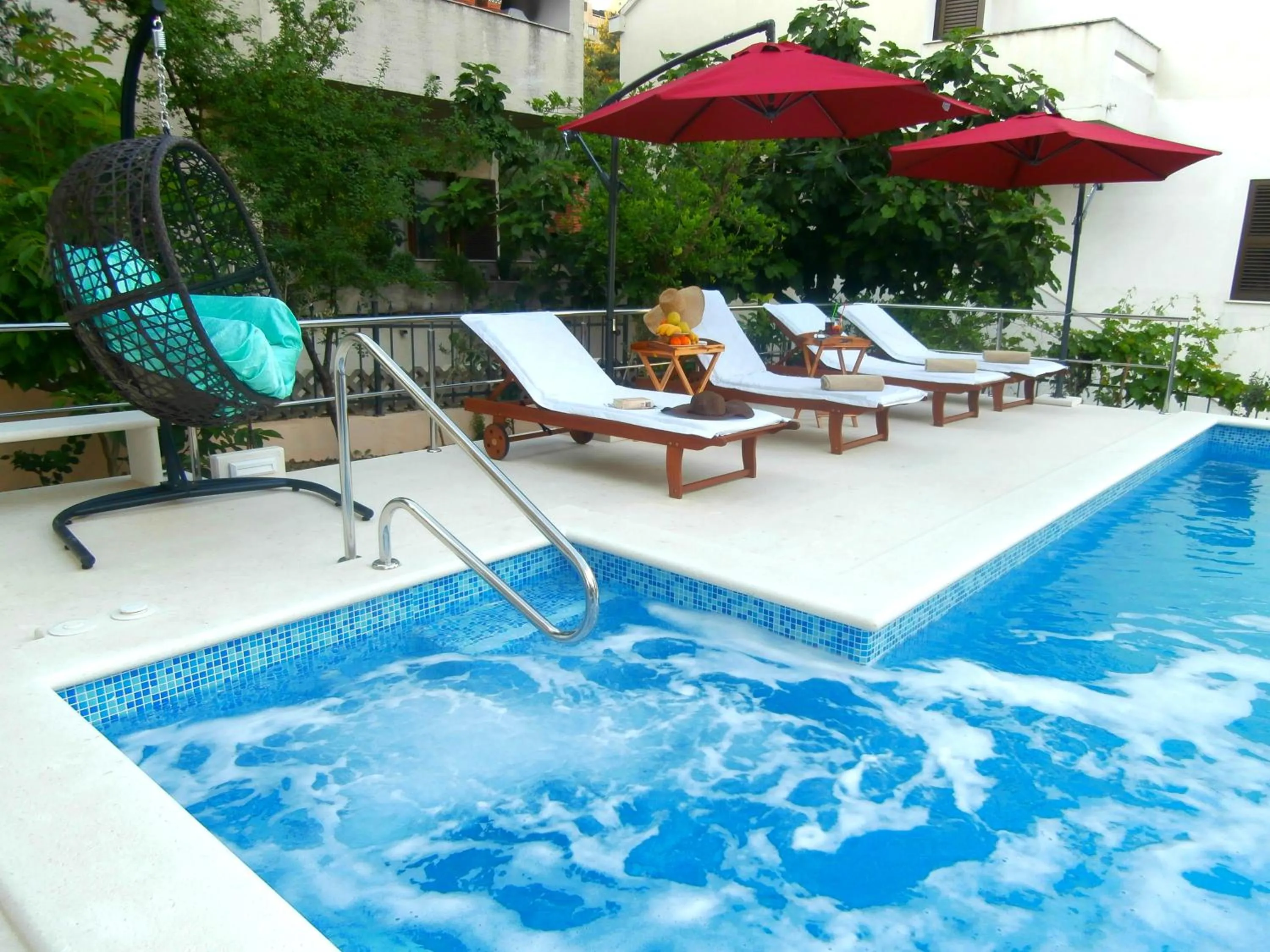 Swimming pool in Apartments Cordis