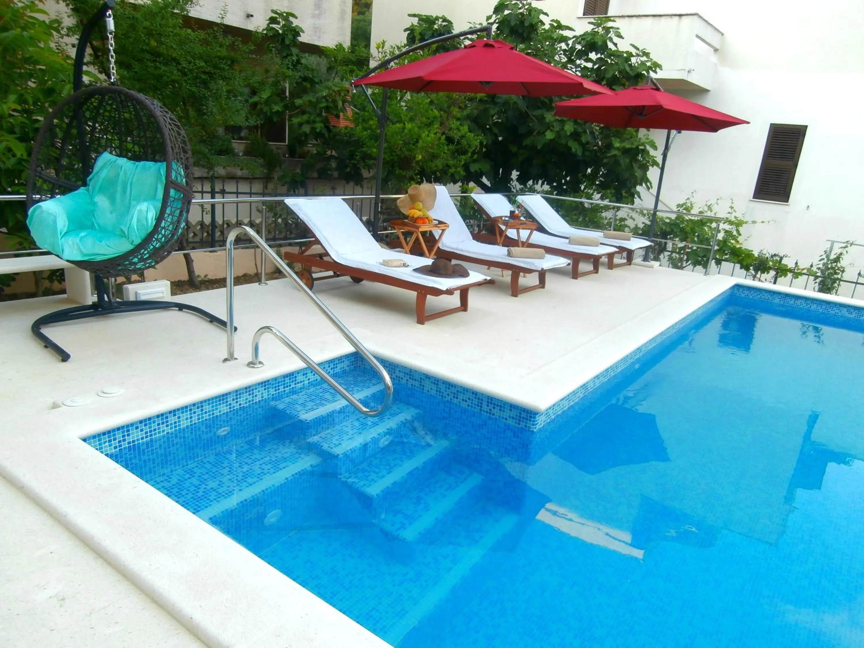Swimming pool in Apartments Cordis