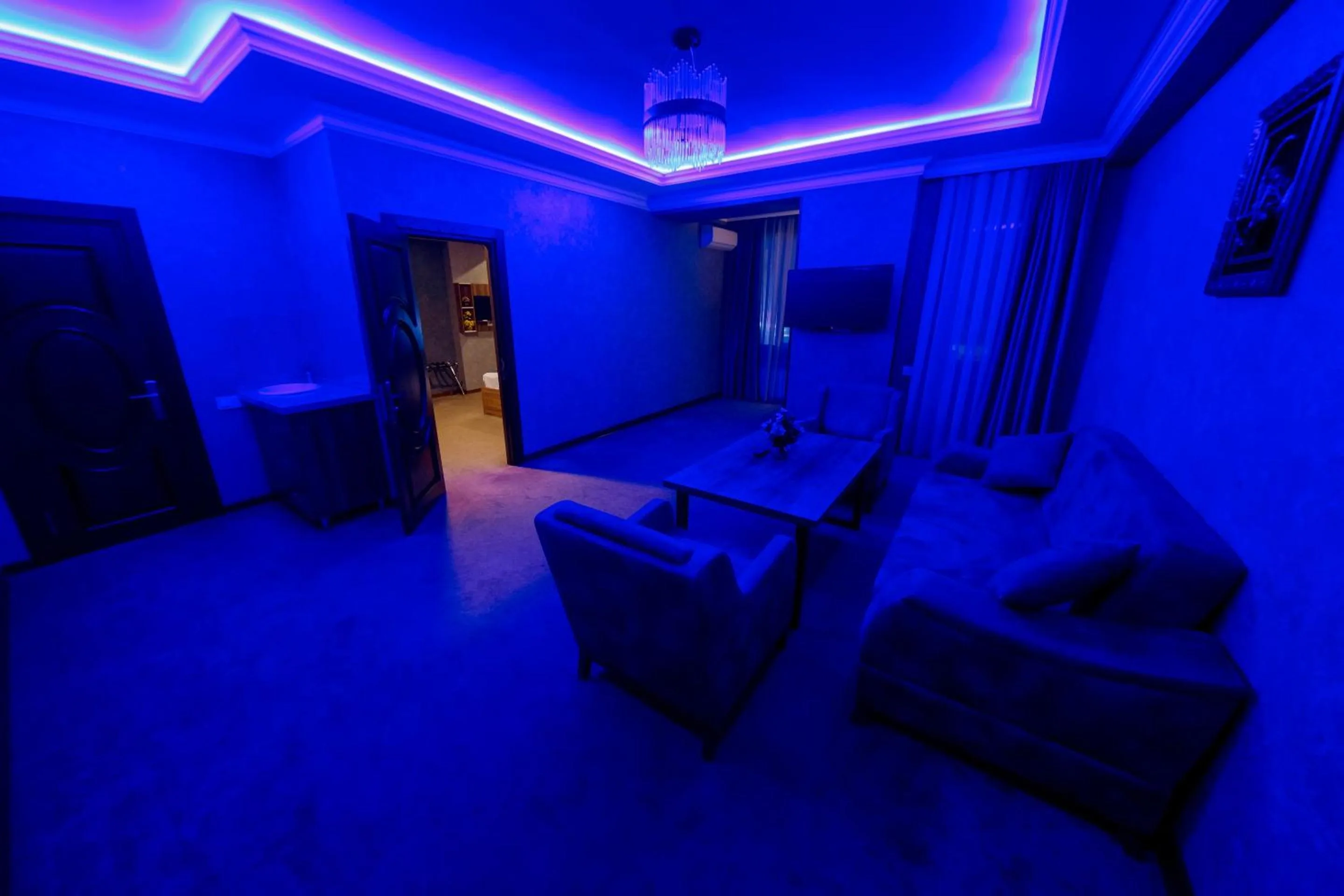 Communal lounge/ TV room in Royal Sapphire Baku