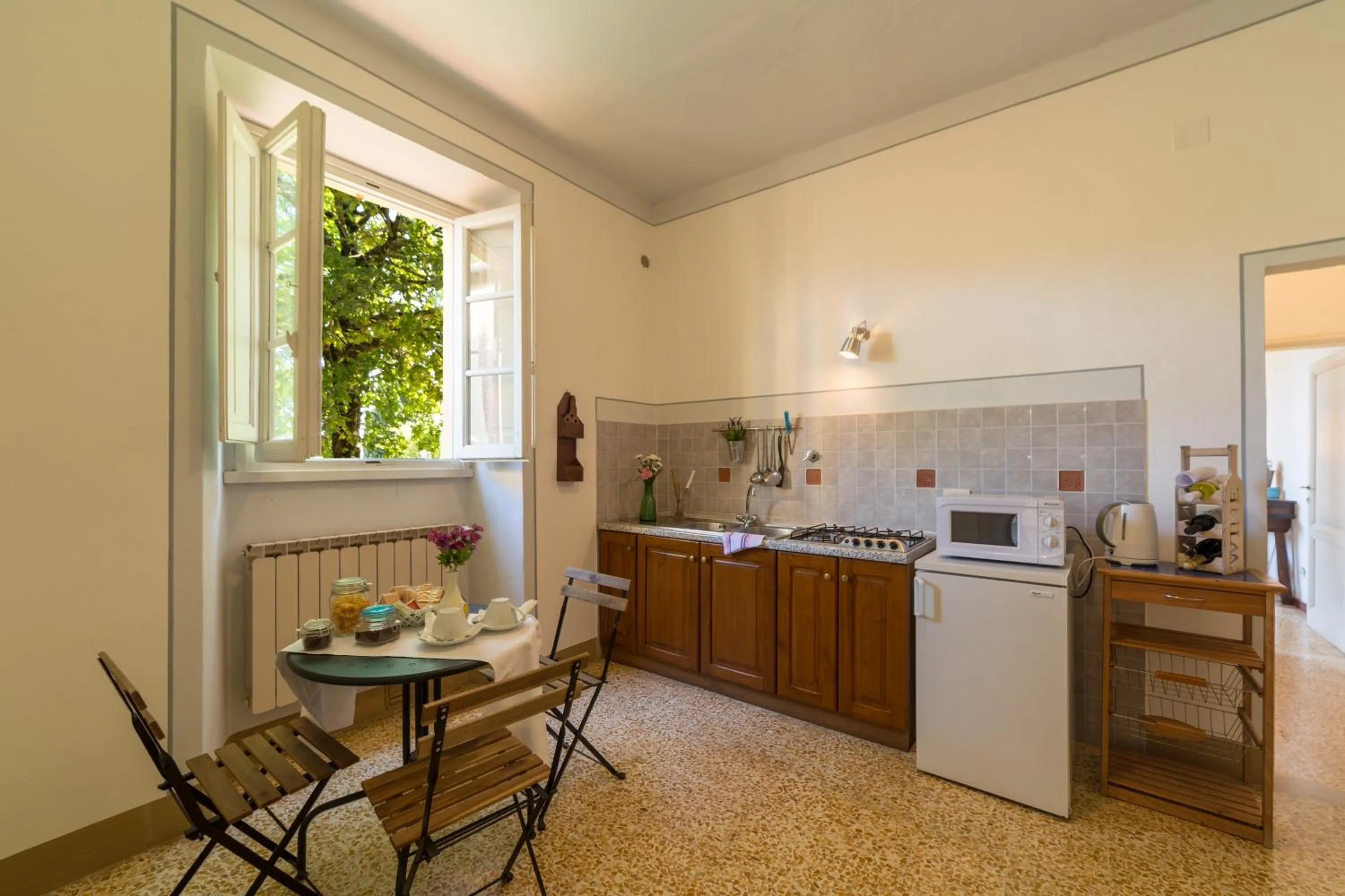Kitchen or kitchenette in Fattoria Pagnana Suites & Pool