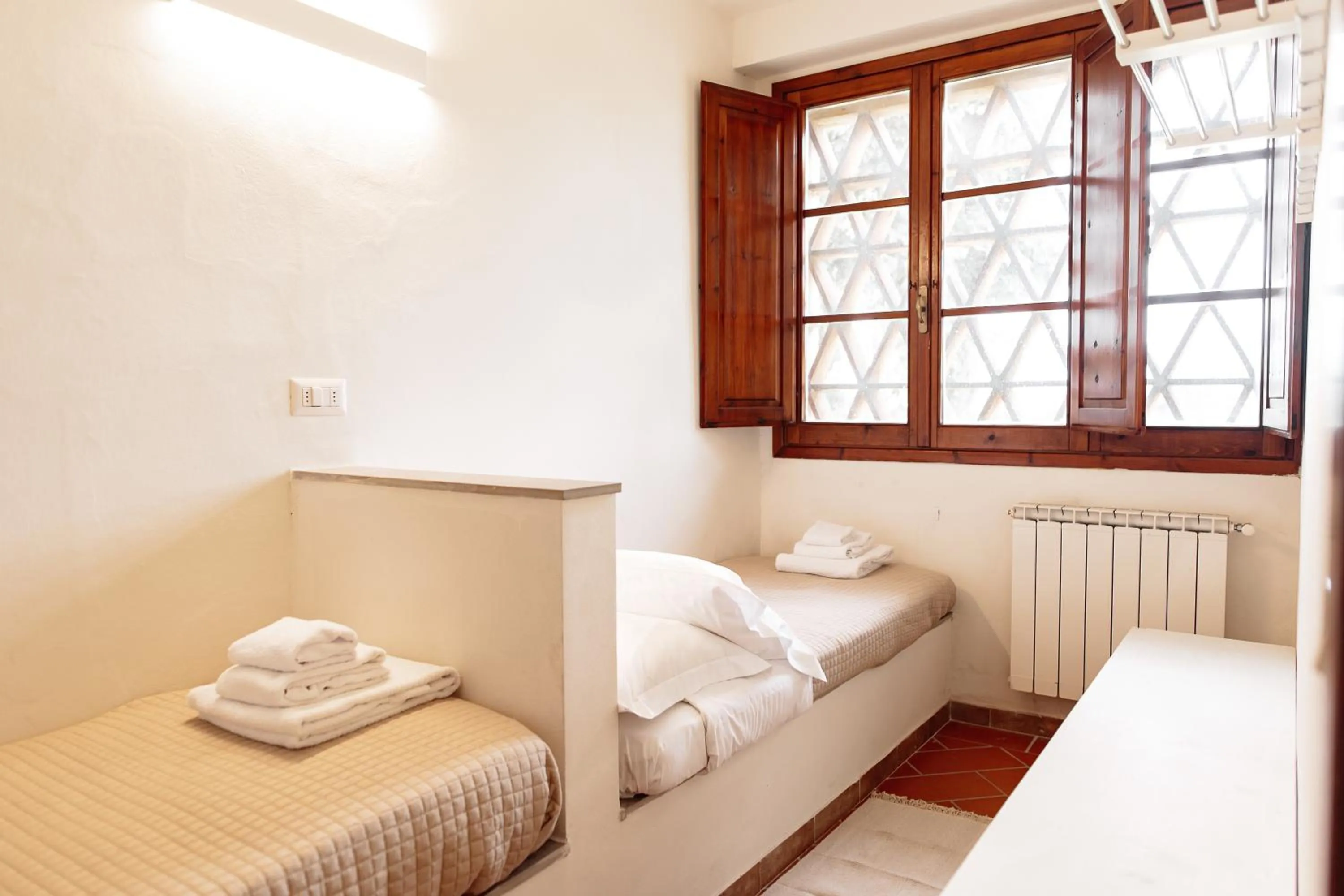 Bed in Fattoria Pagnana Suites & Pool