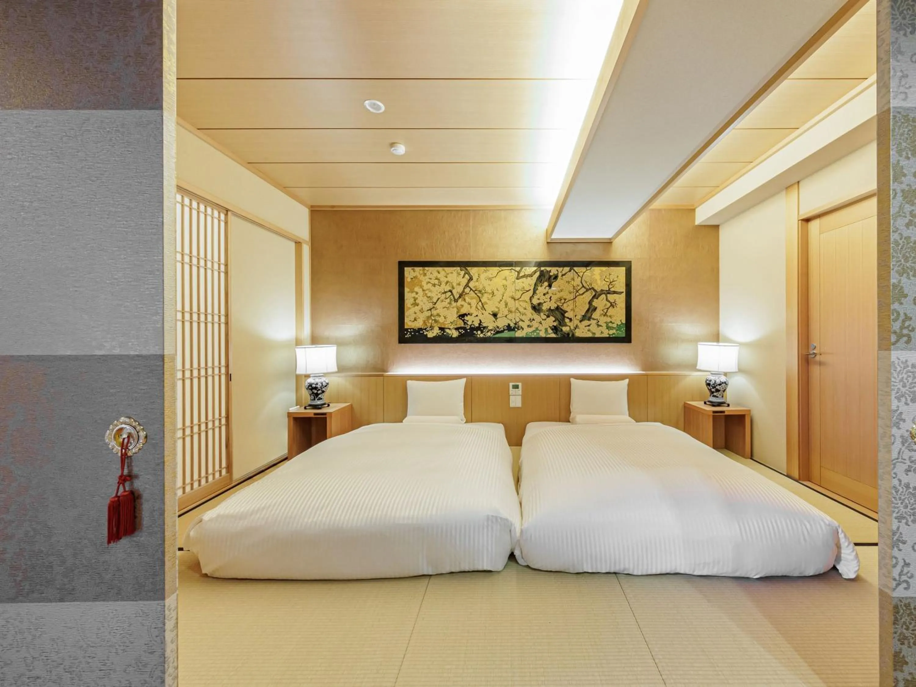 Bed in Kamenoi Hotel Tsukubasan