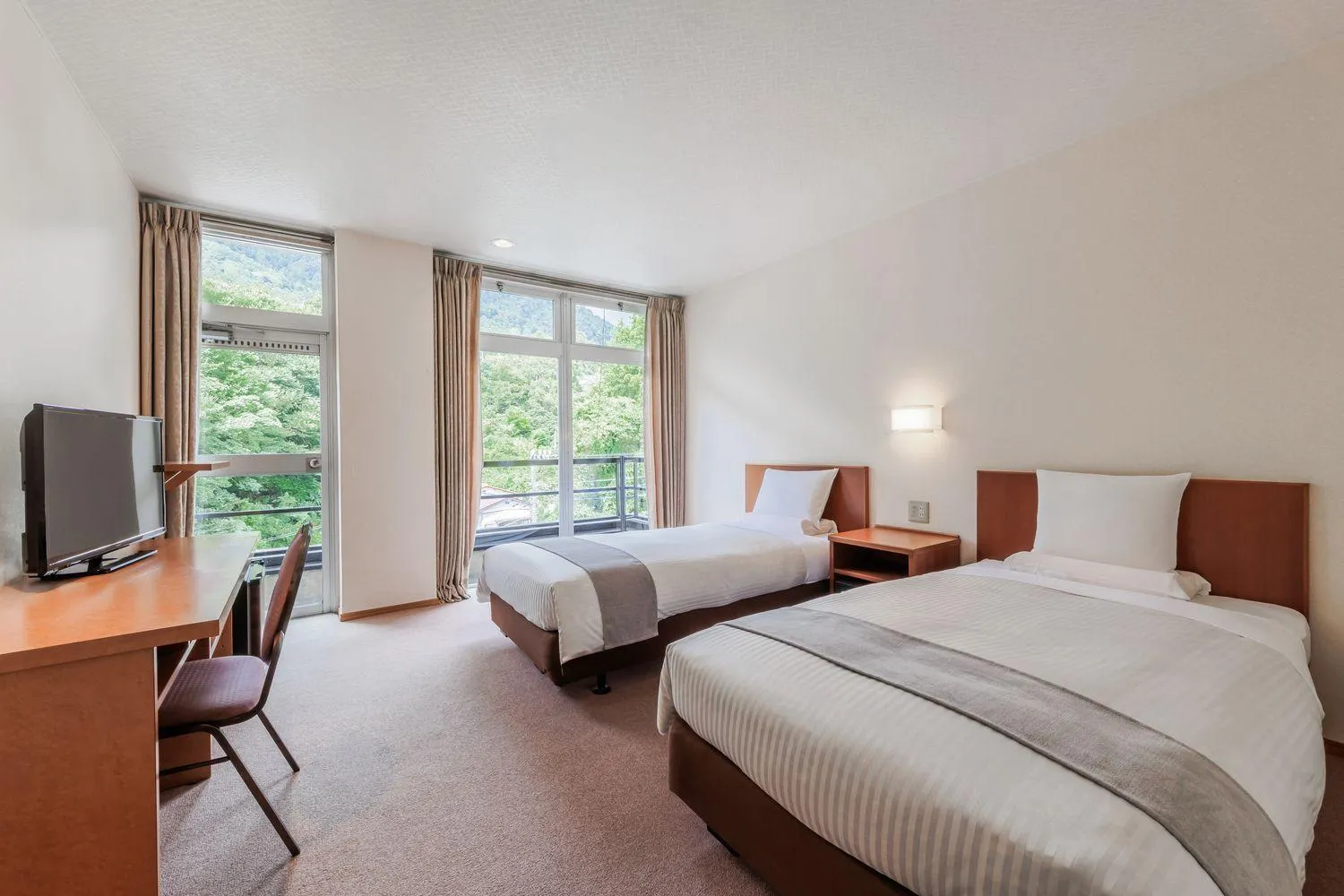 Photo of the whole room, Bed in Kamenoi Hotel Tsukubasan