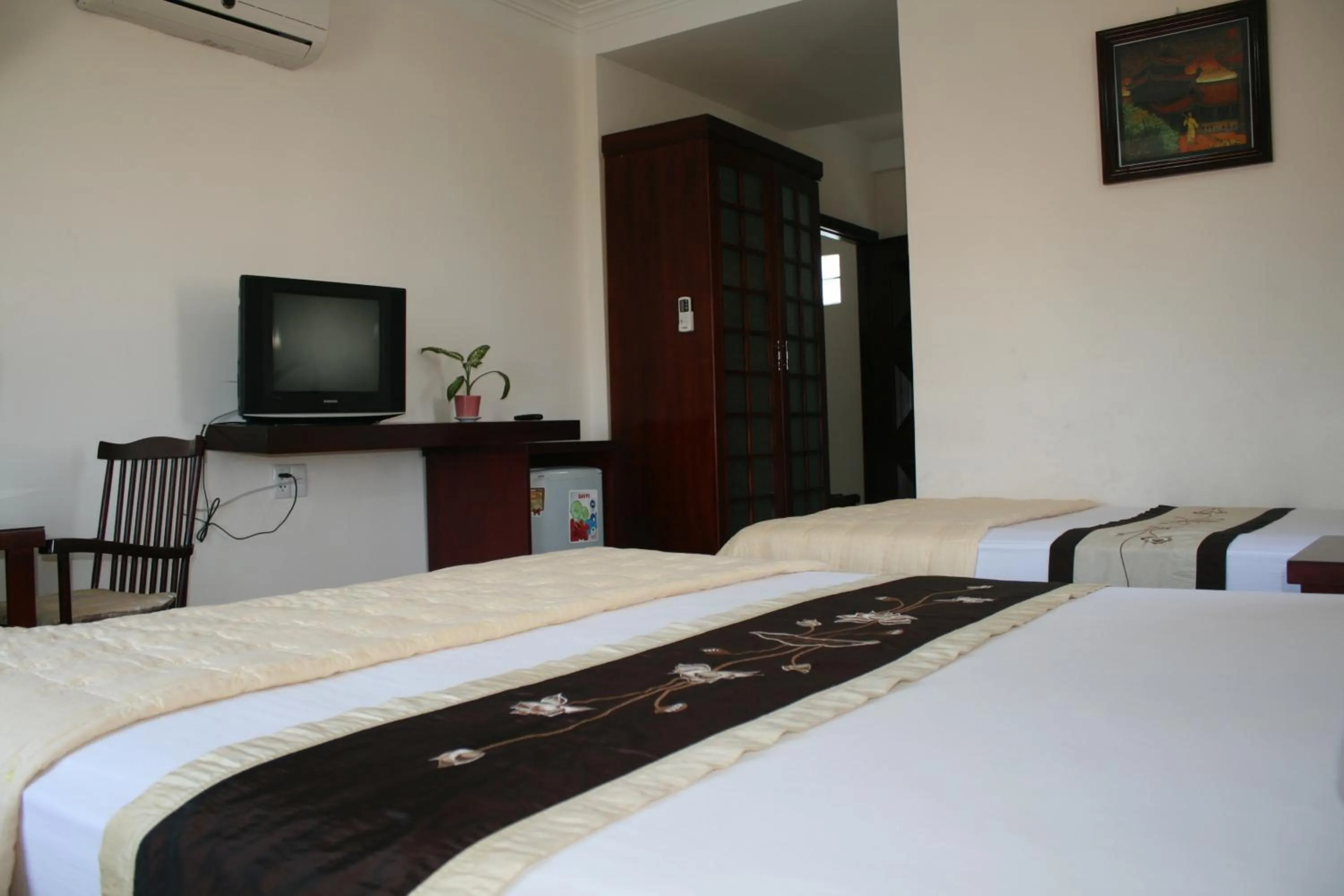 Bed in Nhiet Doi Hotel