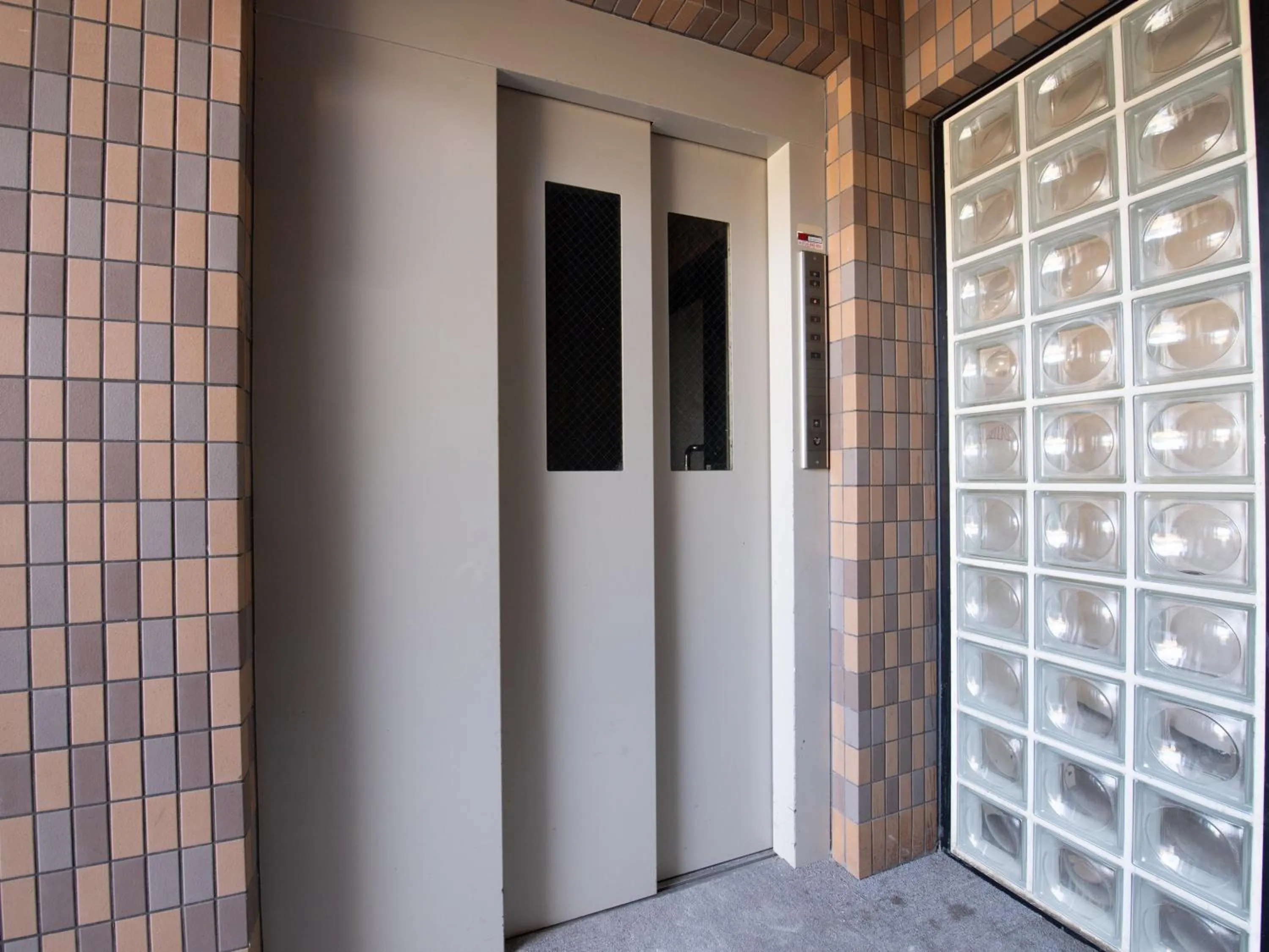 elevator in Tabist Hotel Yamashiro Onsen