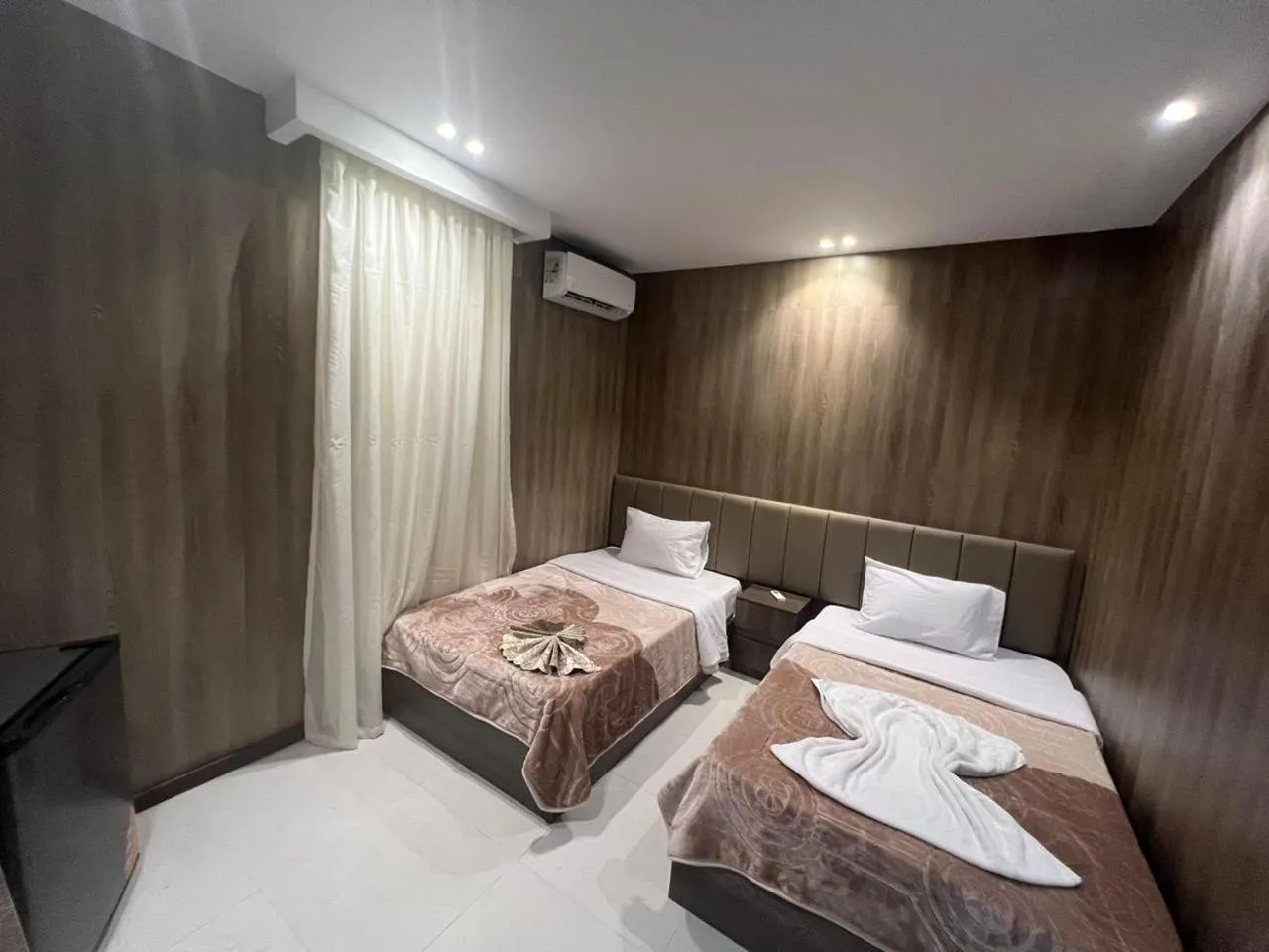 Photo of the whole room, Bed in Rotana Palace Suites