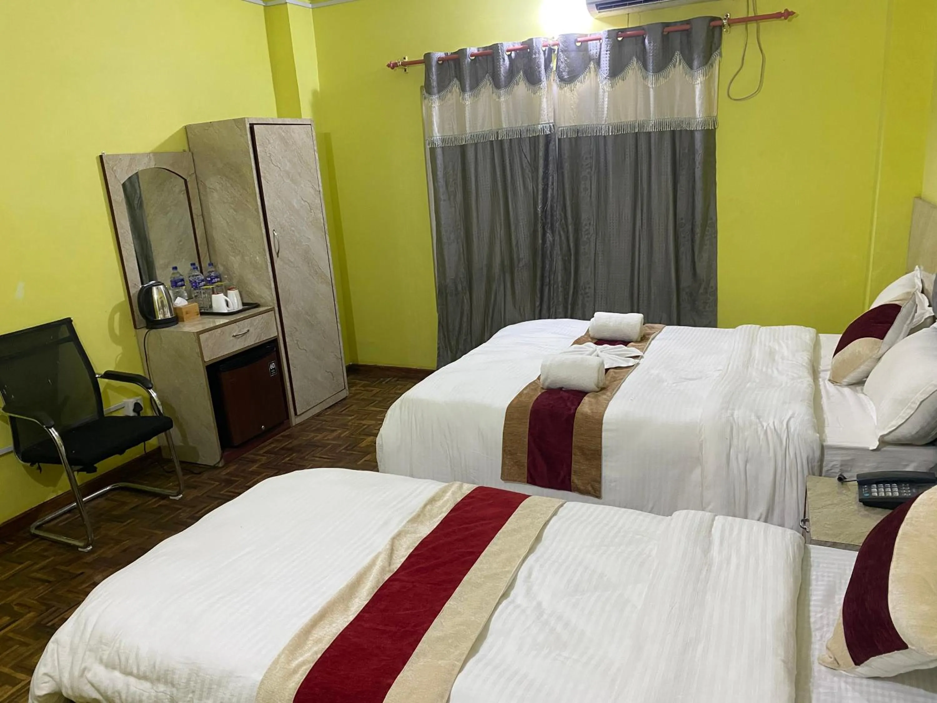 Bed in Hotel Kavya Inn