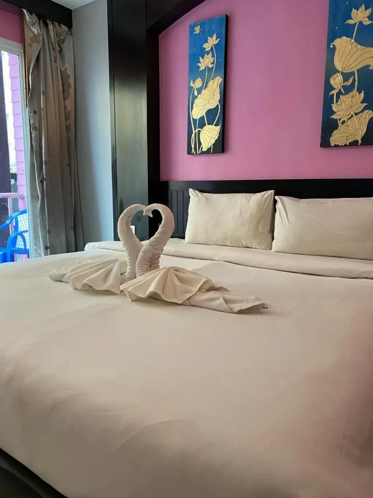 Bed in New Lavender Hotel Patong