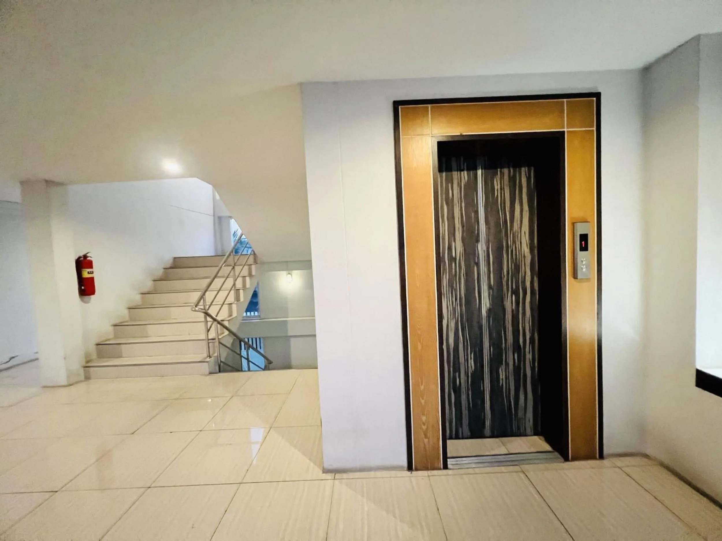 elevator in INN Kham Apartment