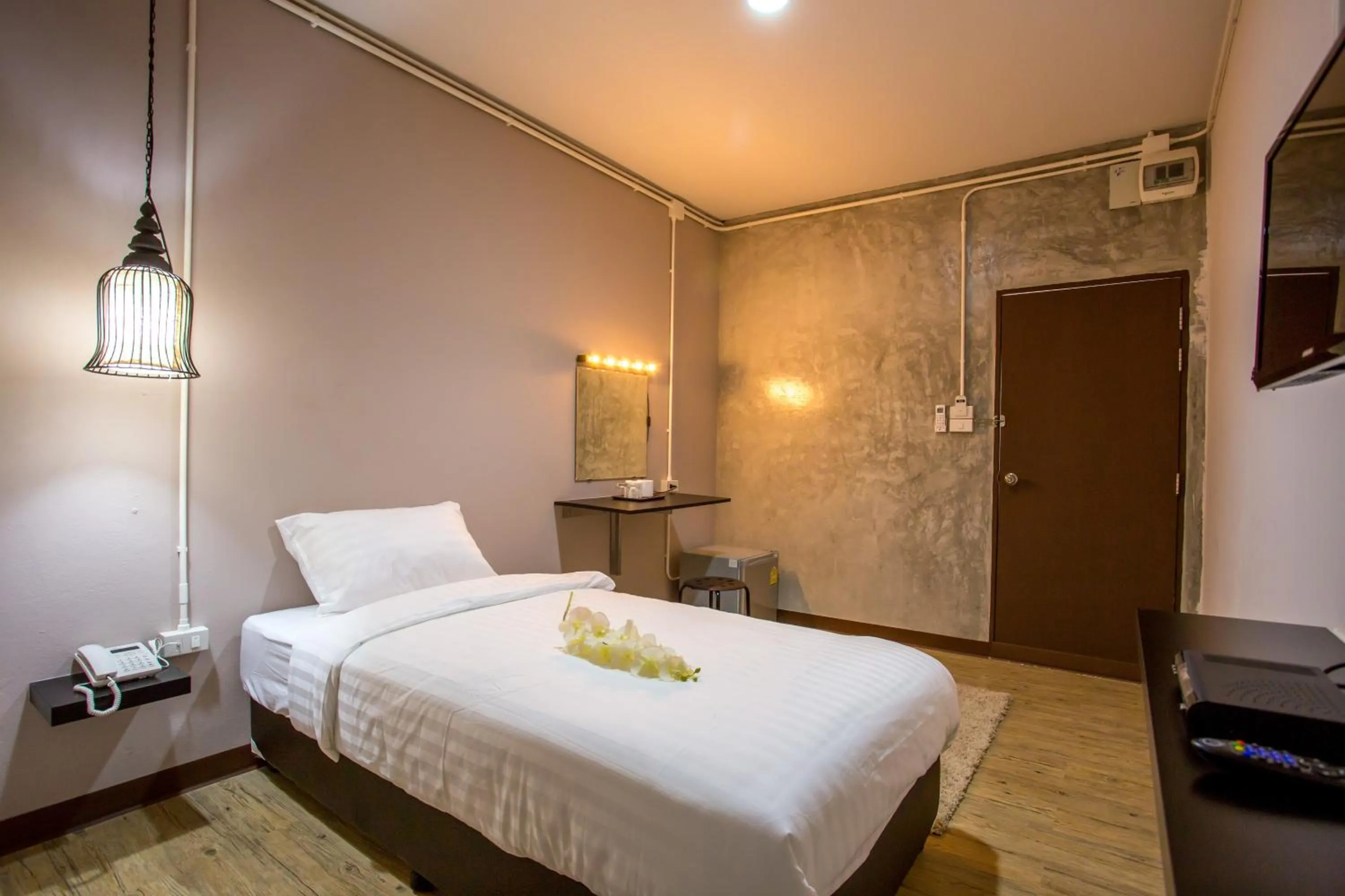 Photo of the whole room, Bed in First Residence