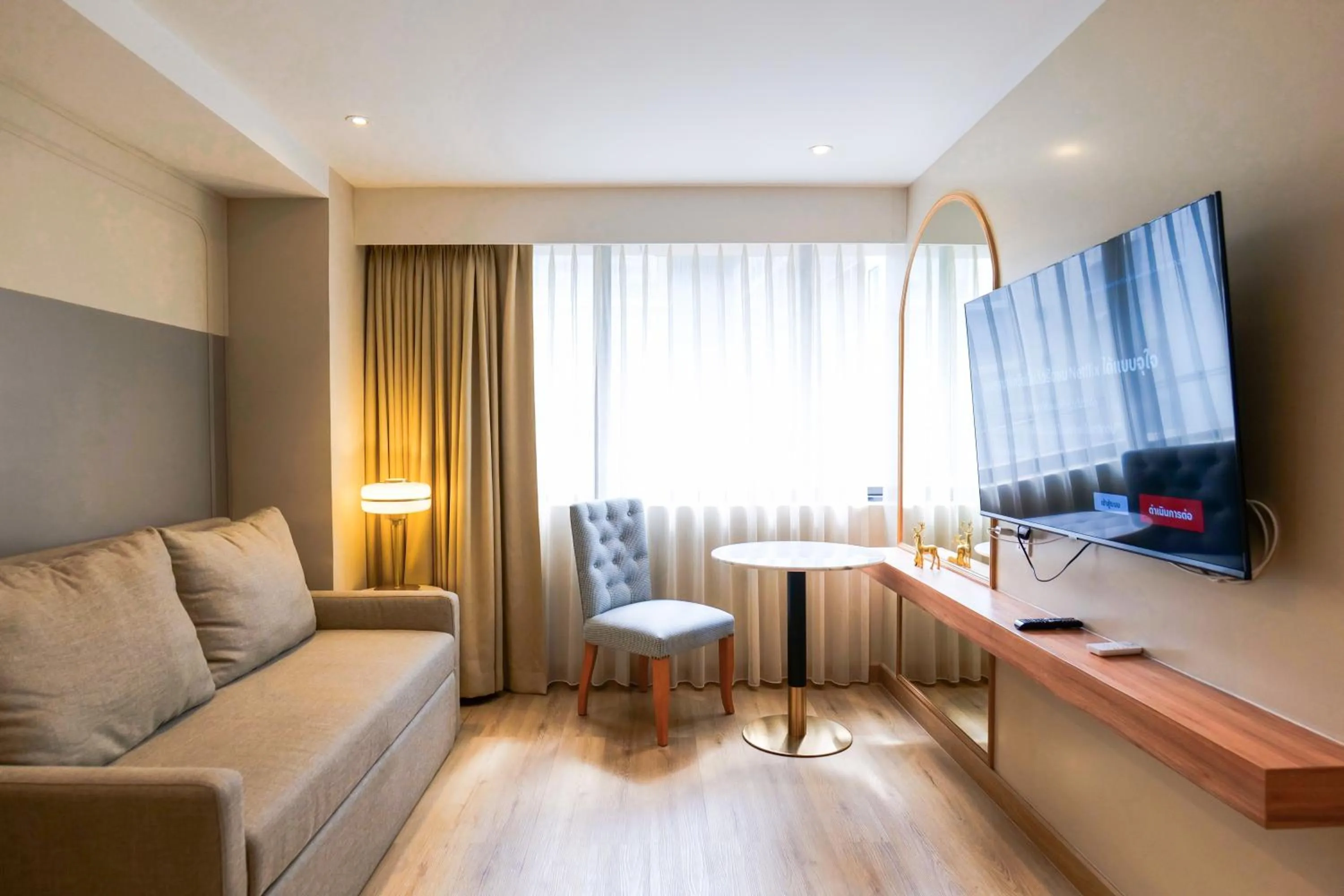 Living room in THEE Bangkok by TH District "newly renovated"