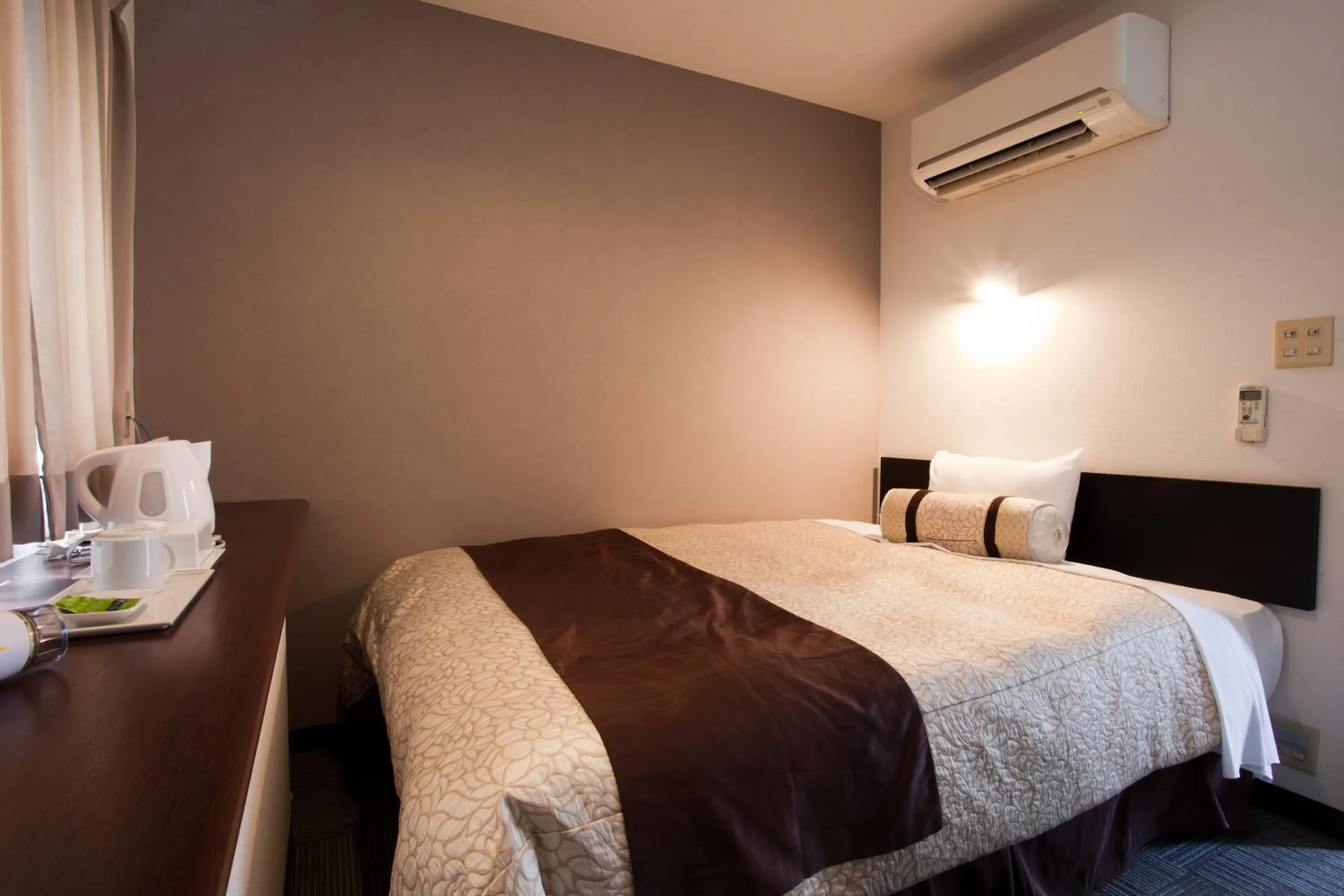 Bed in Kakegawa Station Hotel